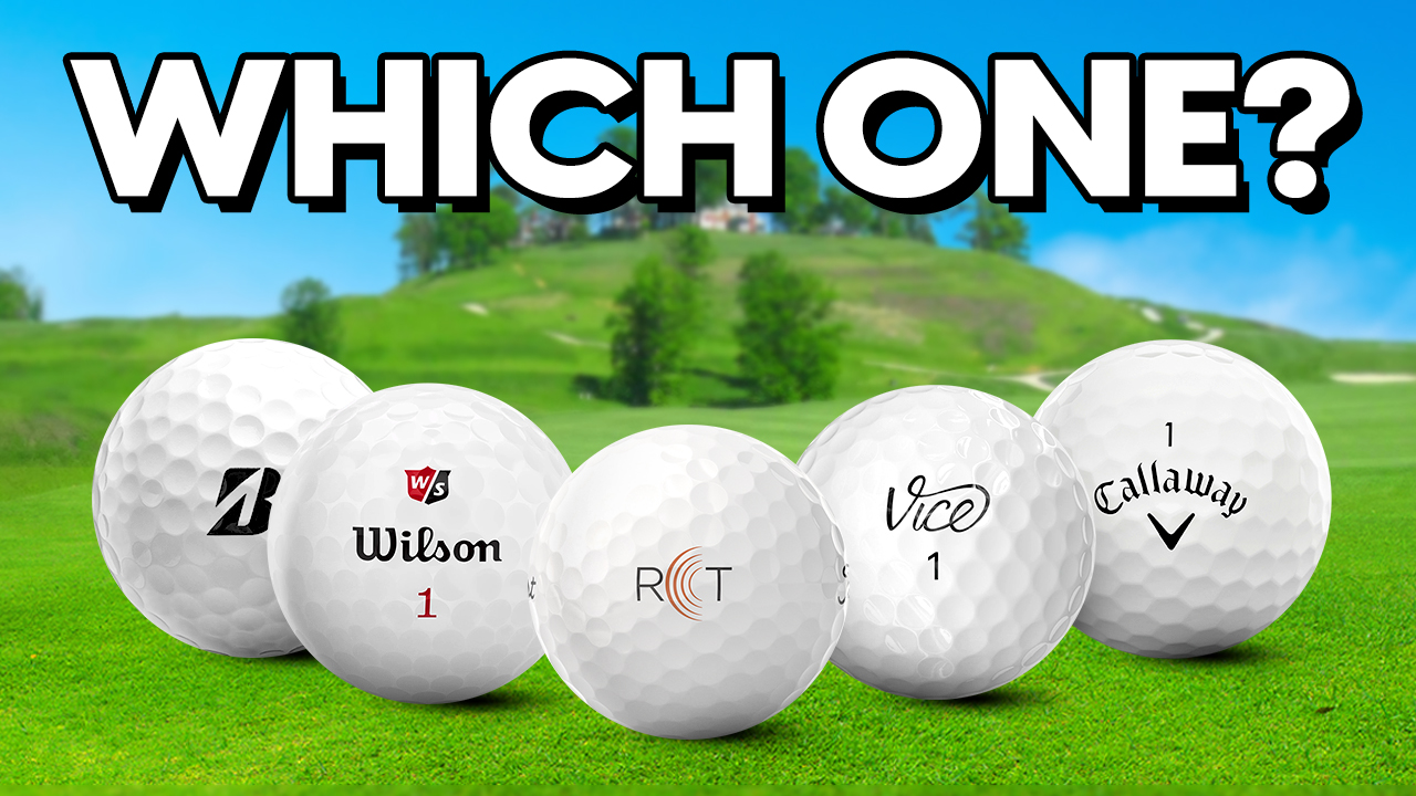 Five branded golf balls on a sunny course