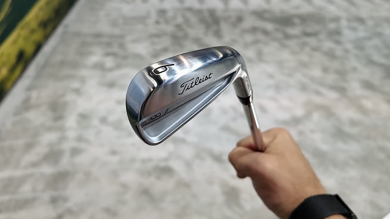 Close-up of a Titleist golf club being held