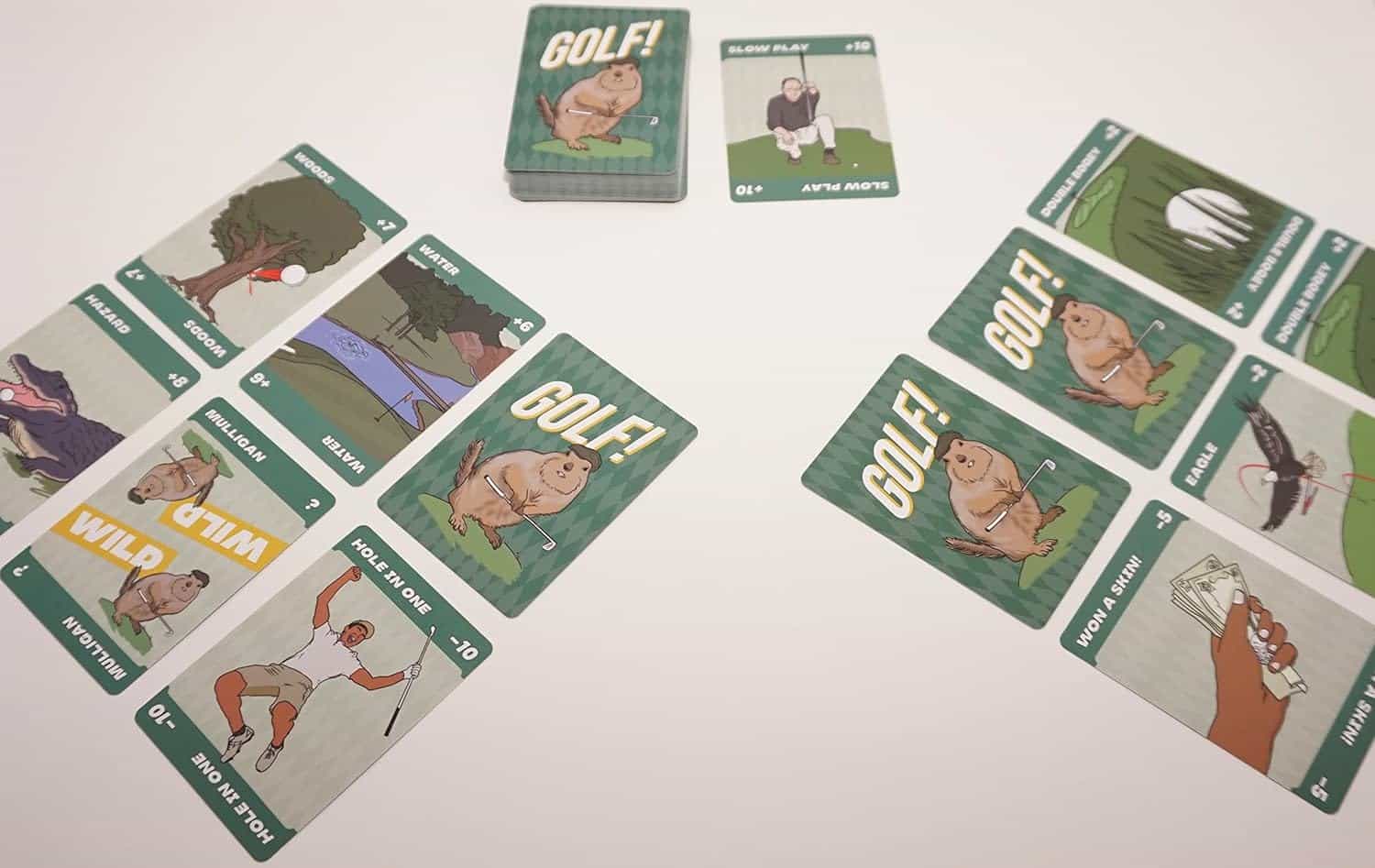Colorful golf-themed cards featuring humorous illustrations.