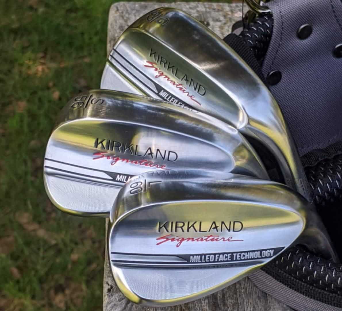Three Kirkland Signature golf wedges in a bag