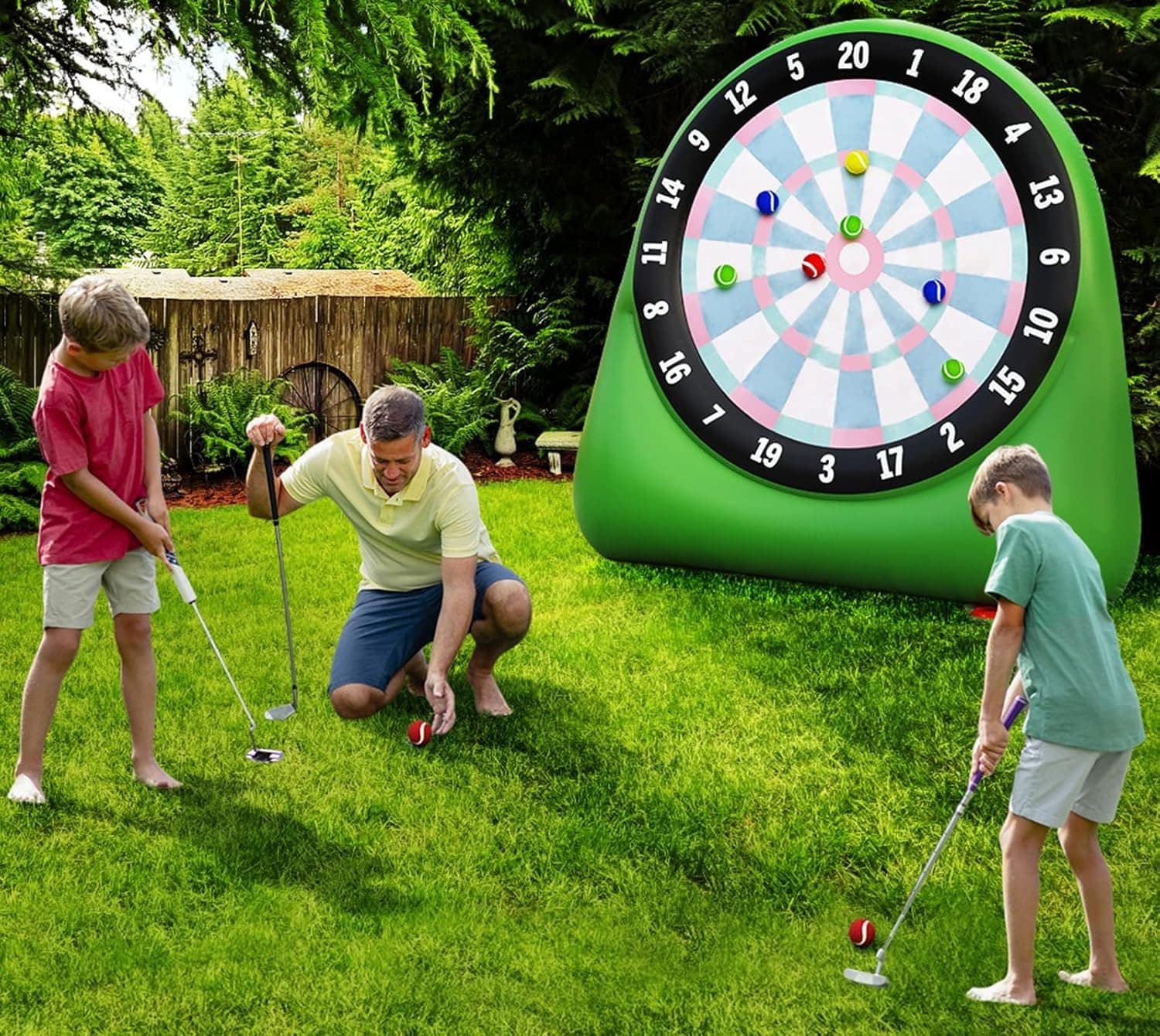 Family playing golf game in backyard.