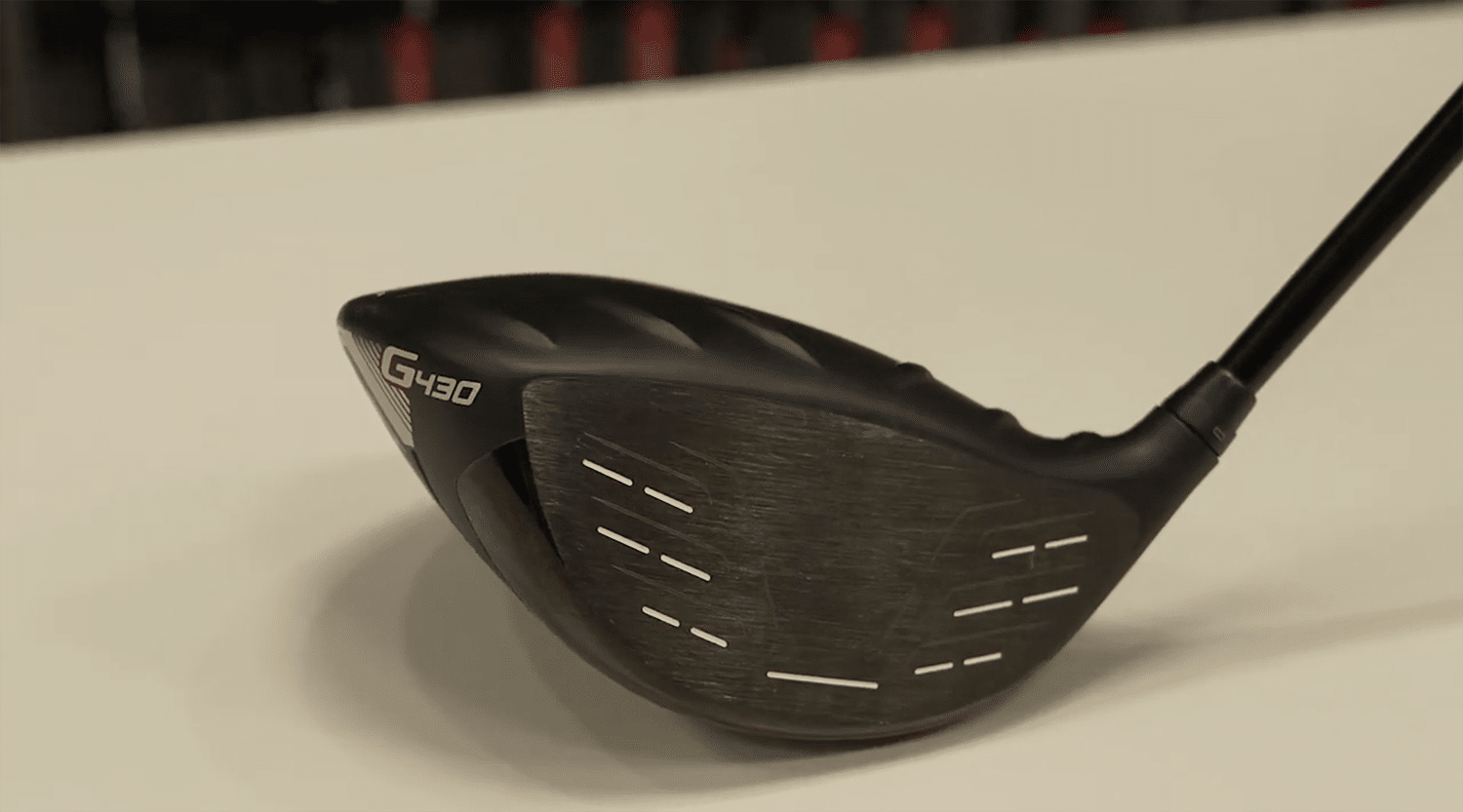 Close-up of a golf driver clubhead.