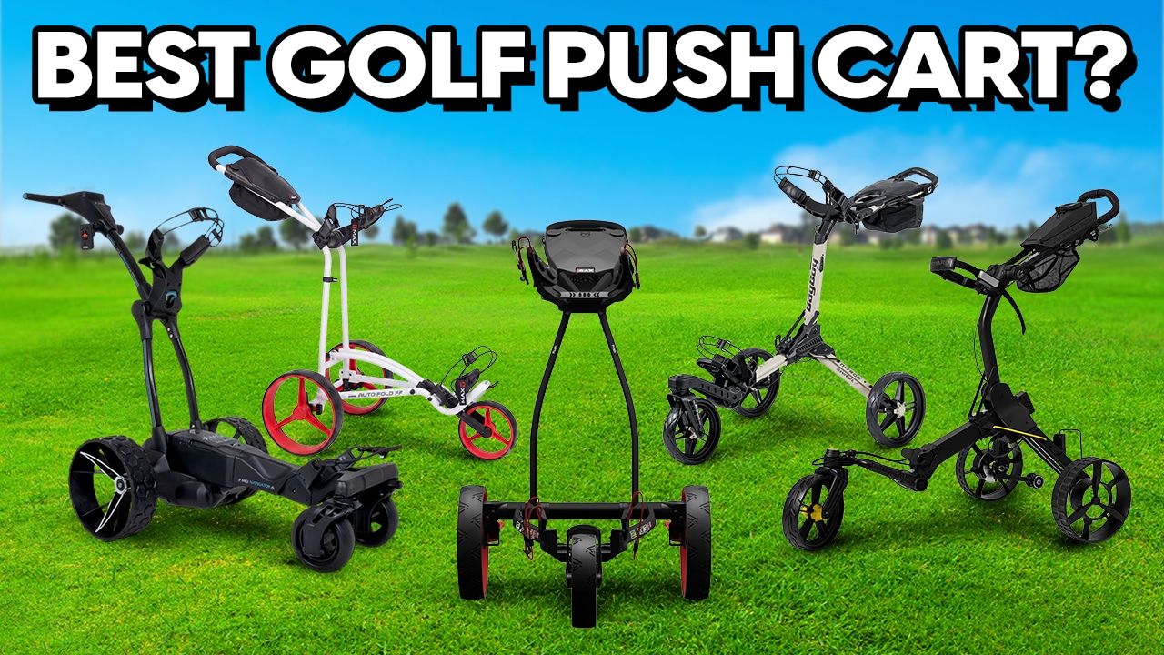 Five golf push carts on grassy course