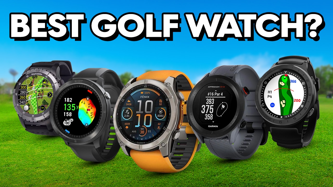 Five golf GPS watches on green grass