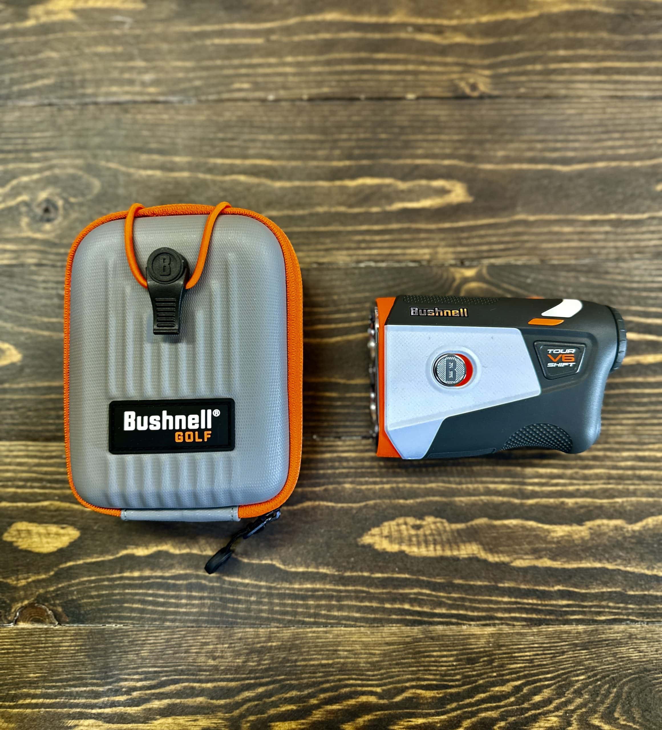 Bushnell golf rangefinder with protective carrying case