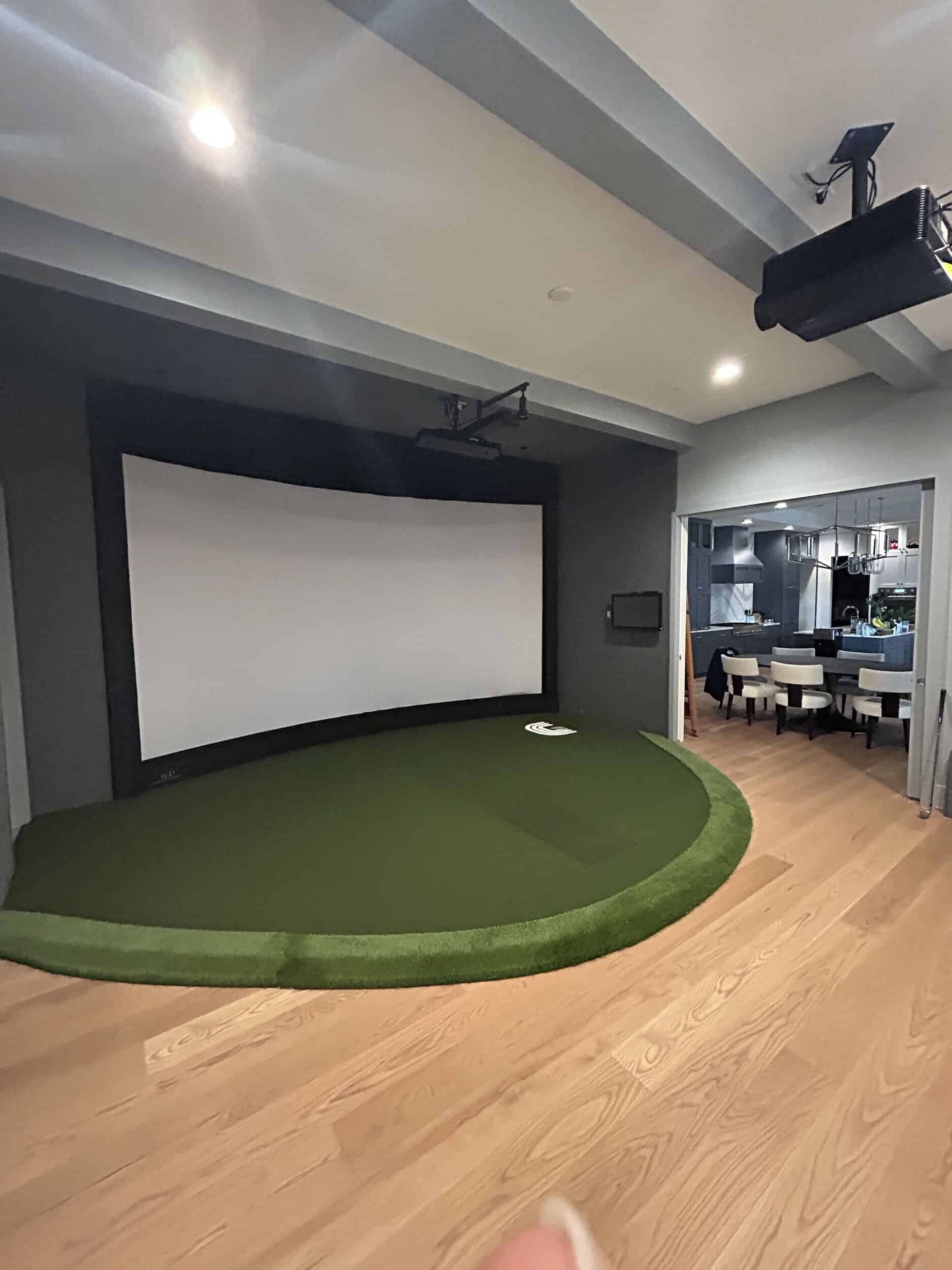 Home golf simulator with projector and screen