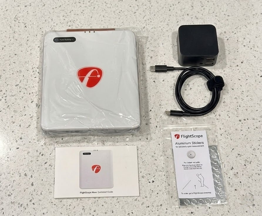 FlightScope Mevo launch monitor with accessories