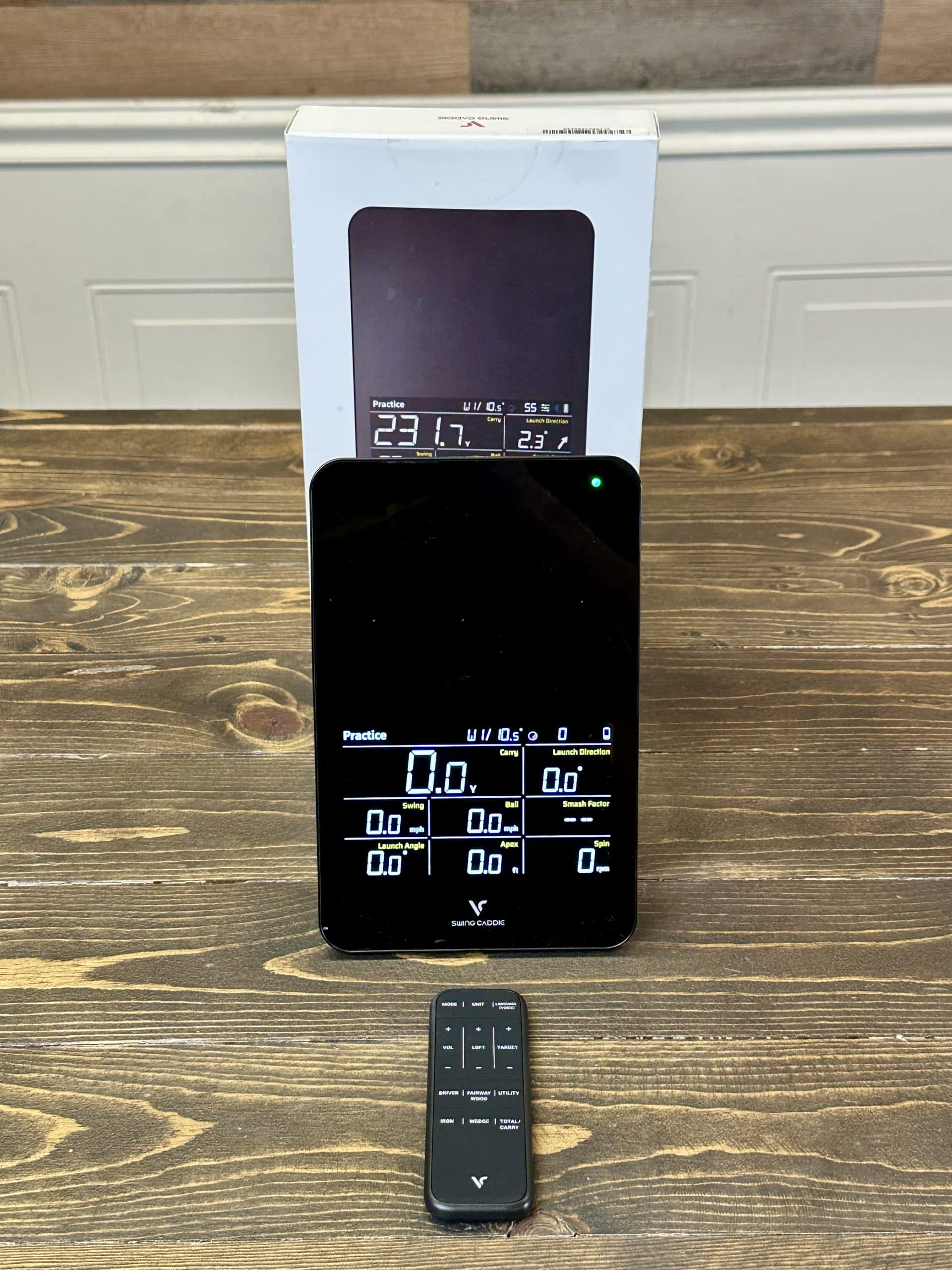 Swing Caddie launch monitor with remote control