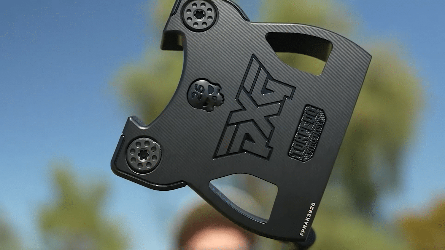 PXG golf putter close-up outdoors