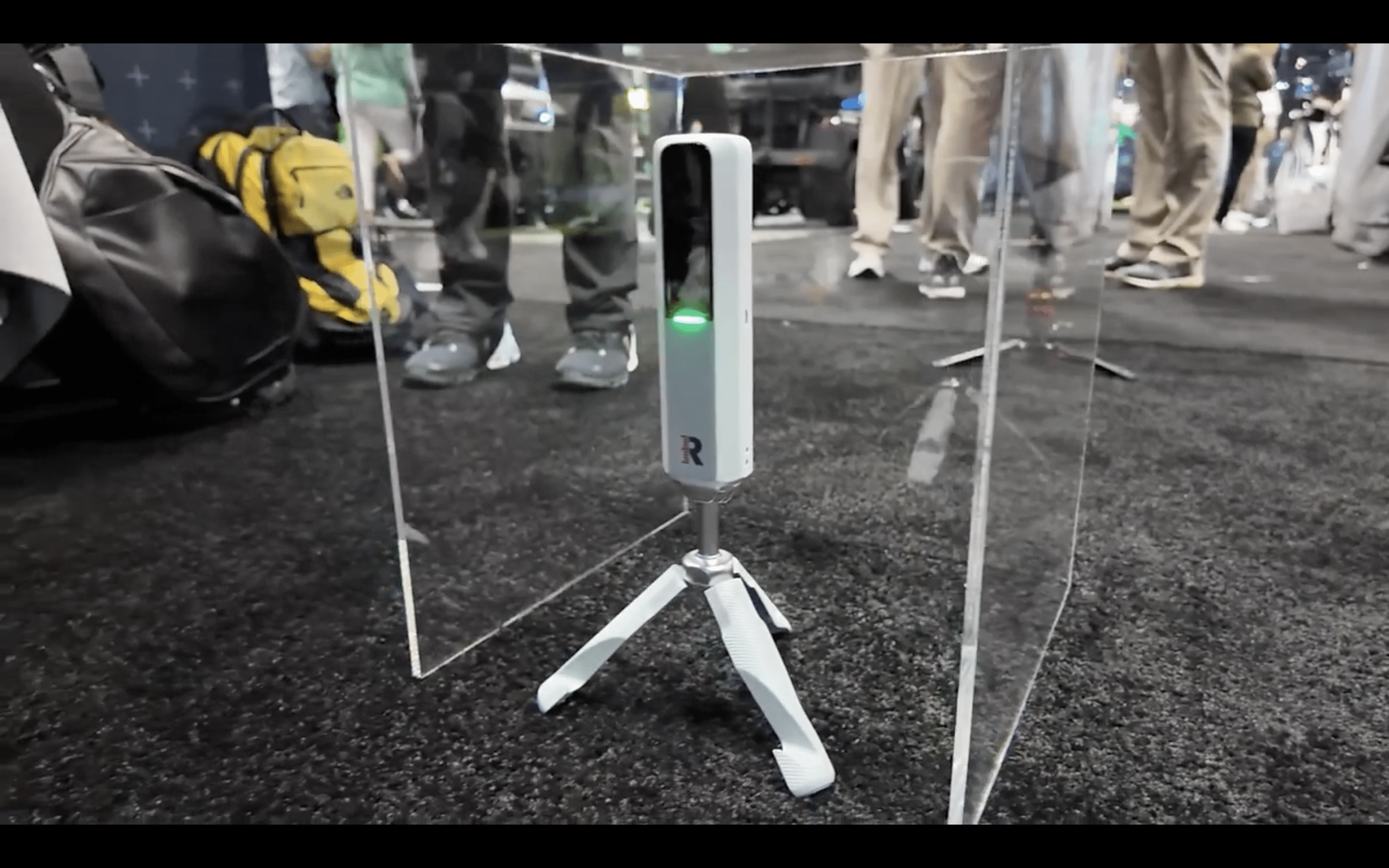 Compact tripod-mounted sensor device on display booth
