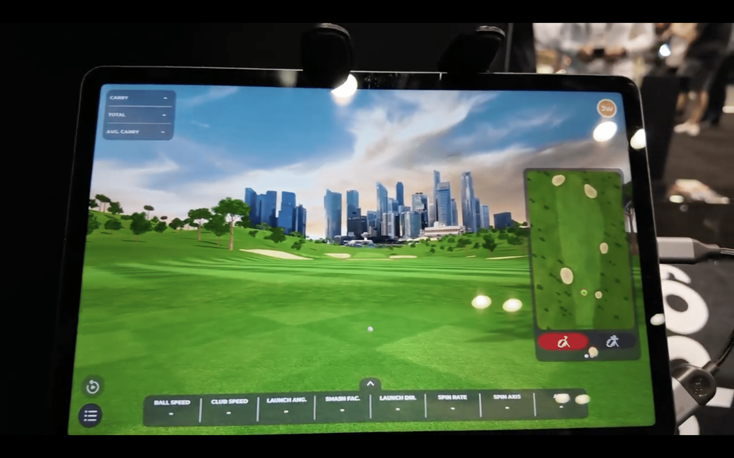 Golf simulator screen showing virtual course and stats