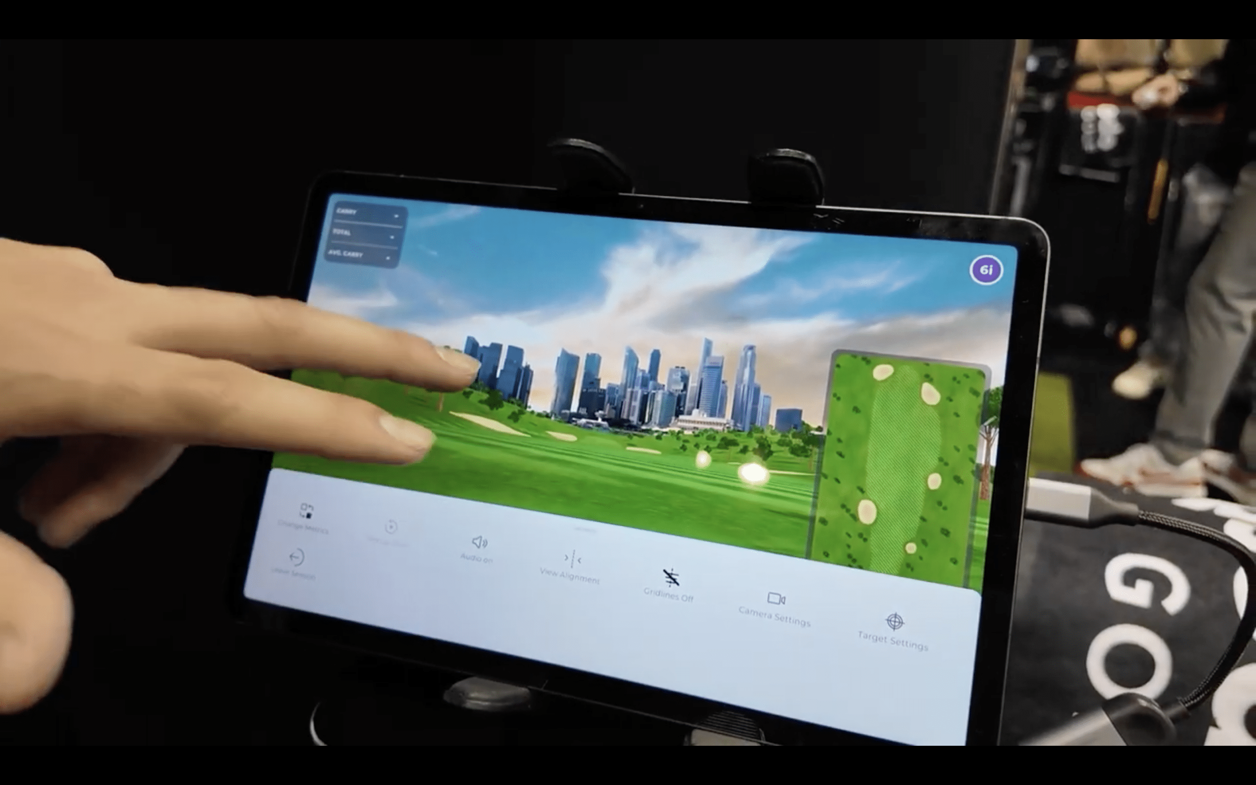 Tablet showing virtual golf course simulation