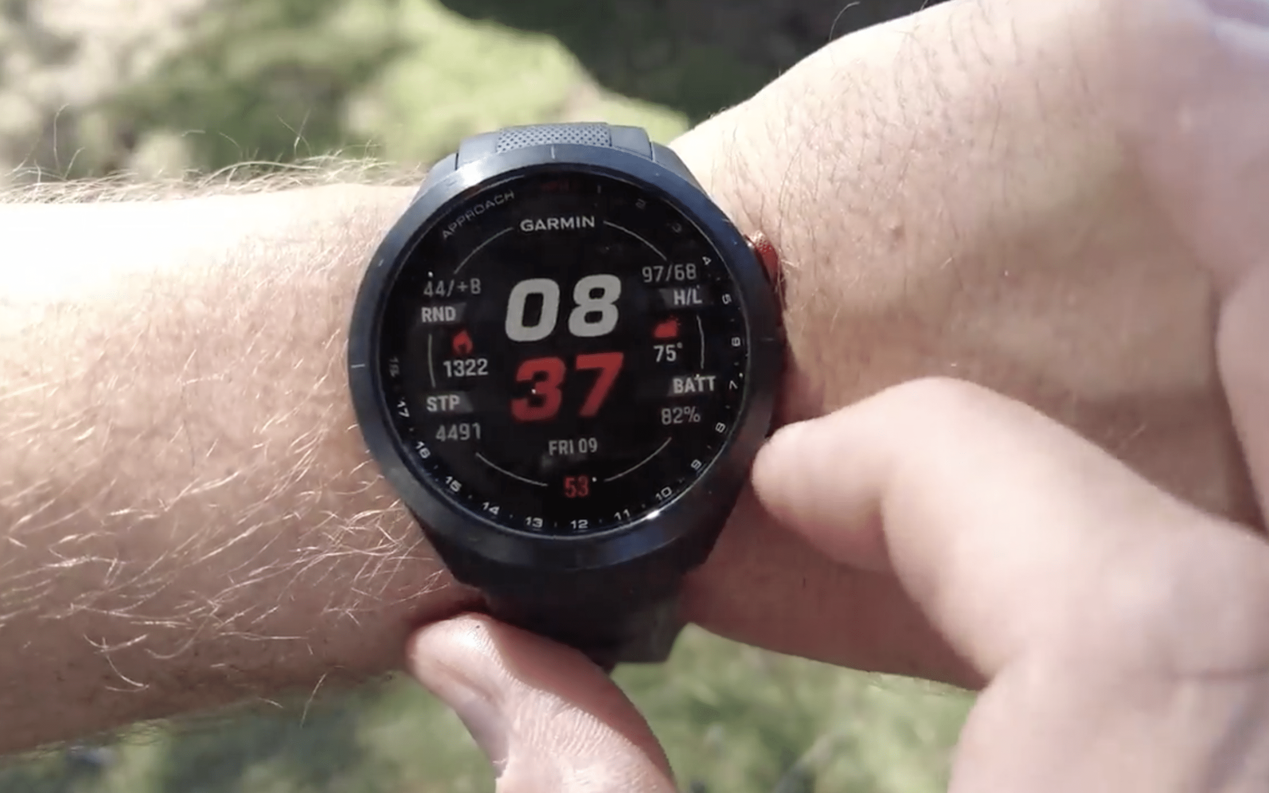 Garmin smartwatch displaying time and fitness stats