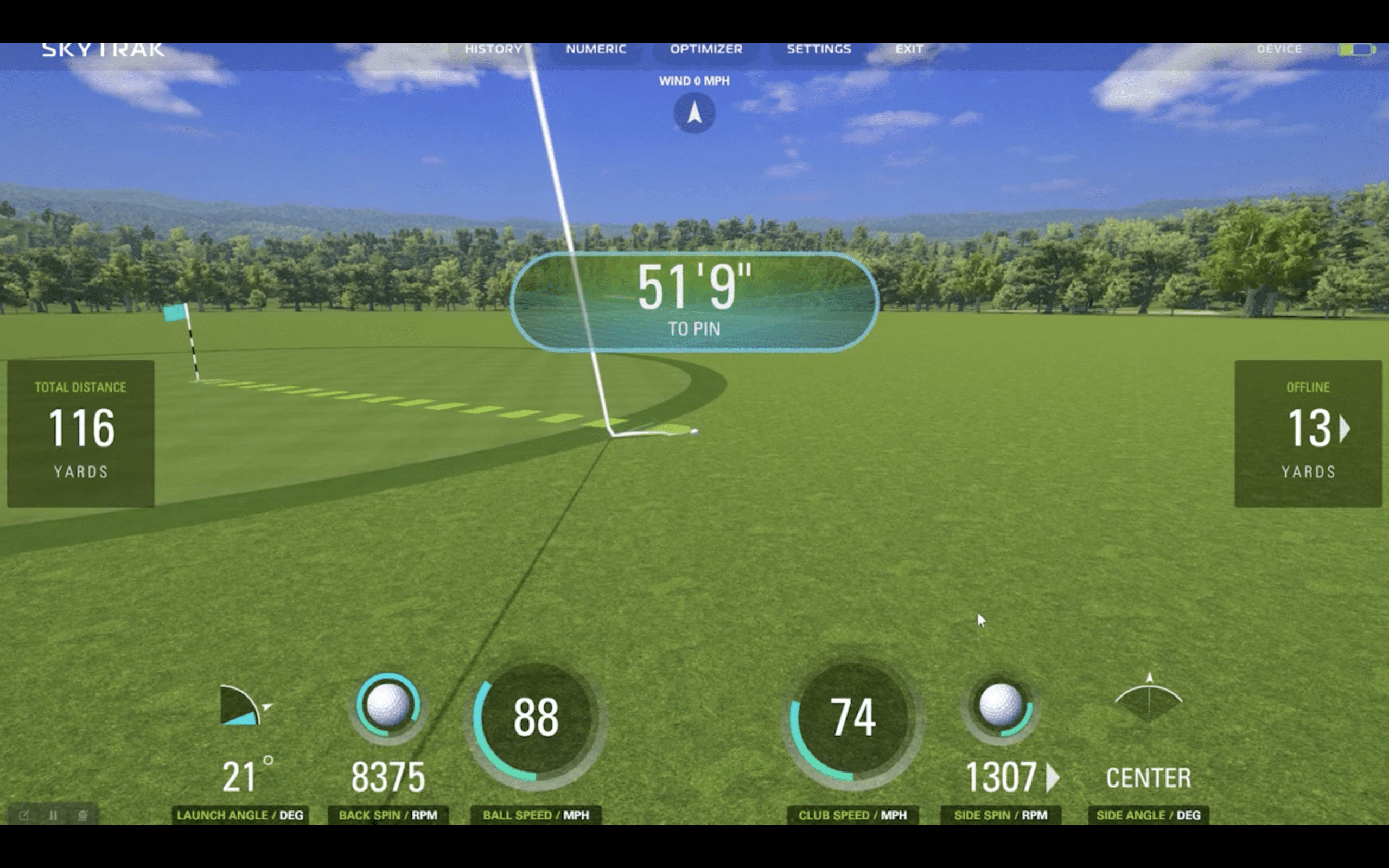 Golf simulator showing shot distance and ball data