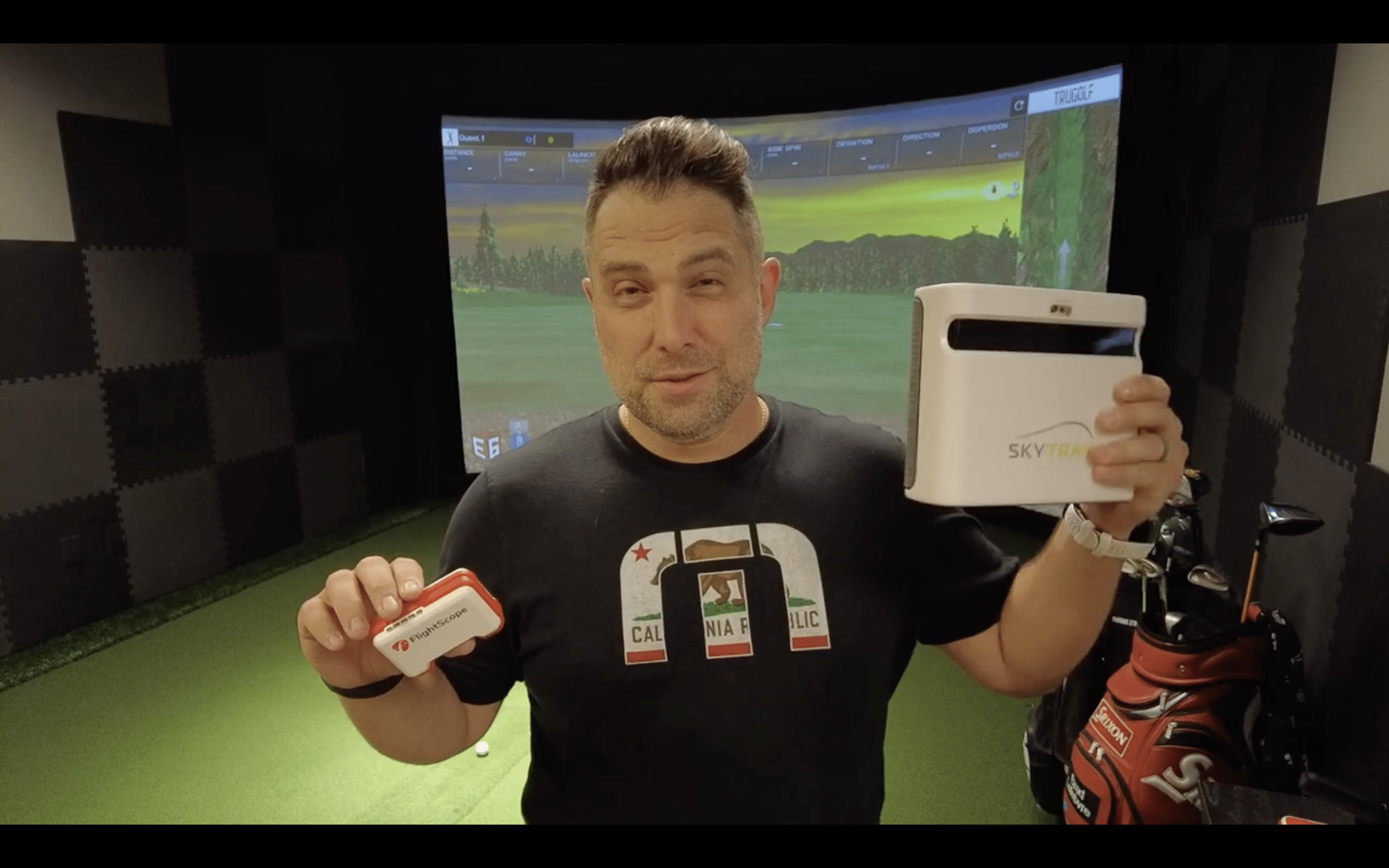 Man holding SkyTrak and FlightScope golf launch monitors