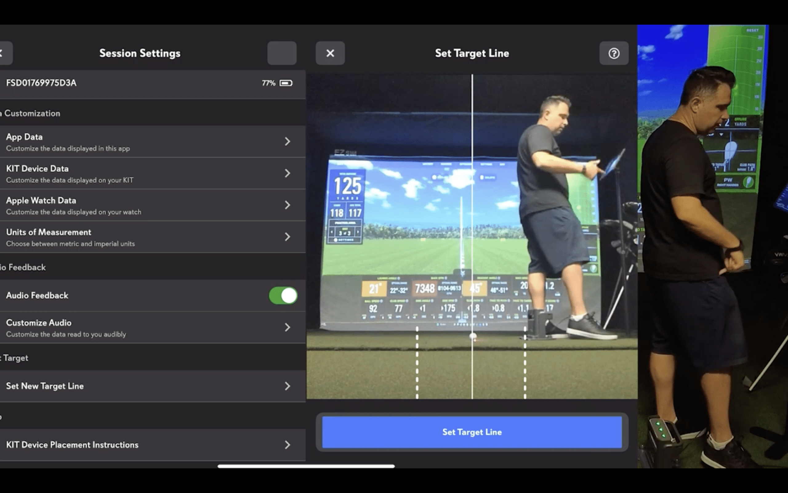 Man setting golf simulator target line indoors
