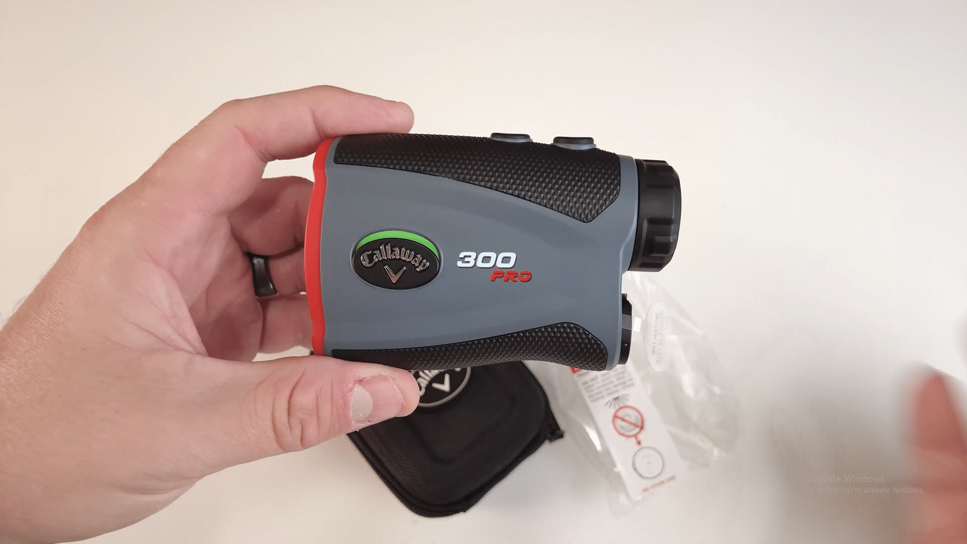 Callaway 300 Pro golf rangefinder in hand