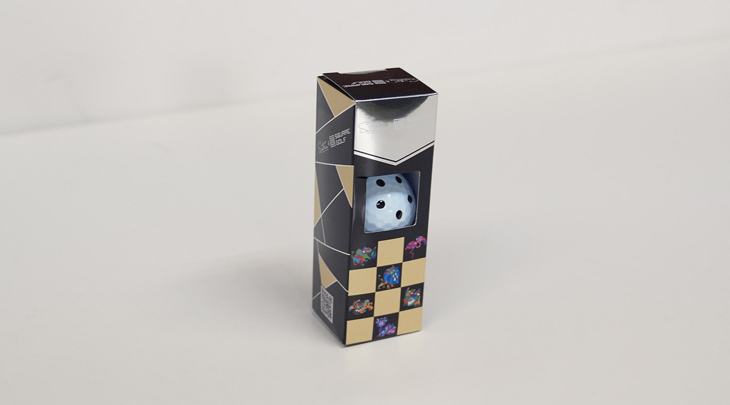 Packaged golf ball in decorative box