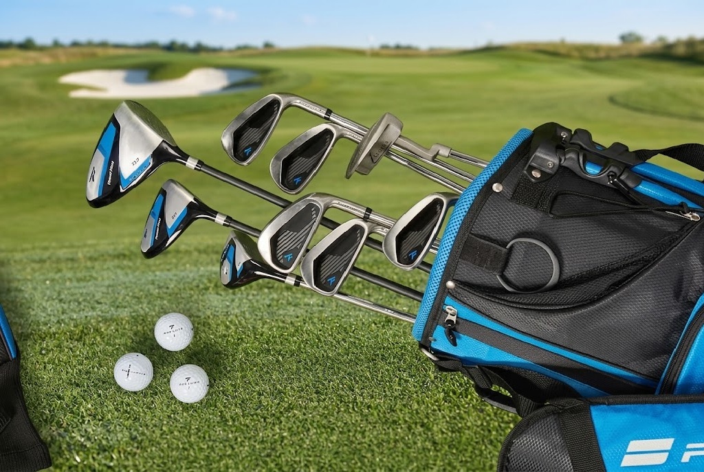 Golf bag with clubs and balls on course