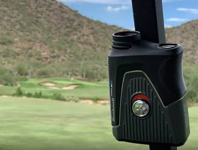 Golf rangefinder mounted during desert golf game