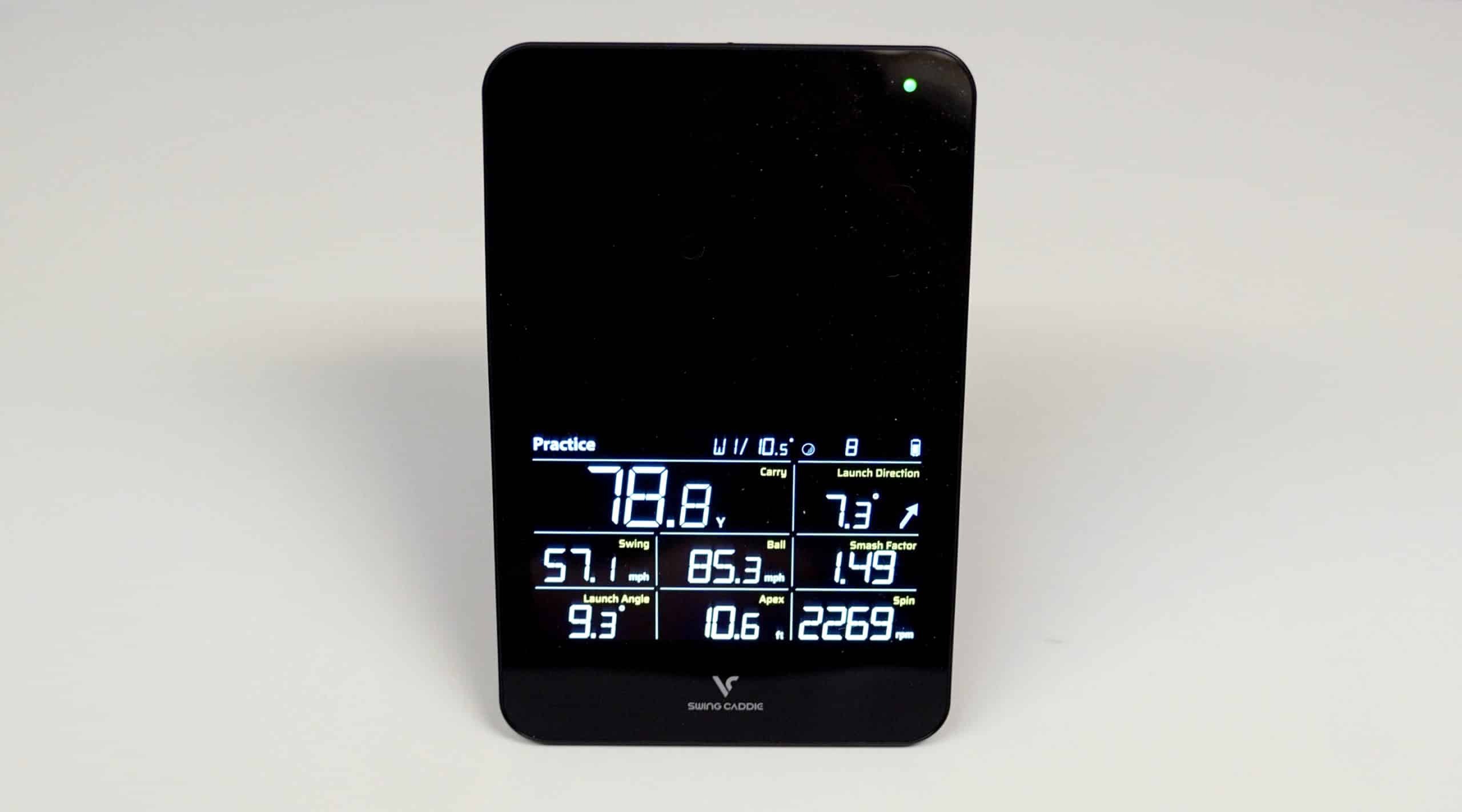 Digital golf launch monitor displaying swing data