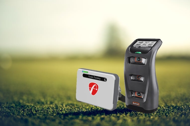 Bushnell golf launch monitors on grassy field
