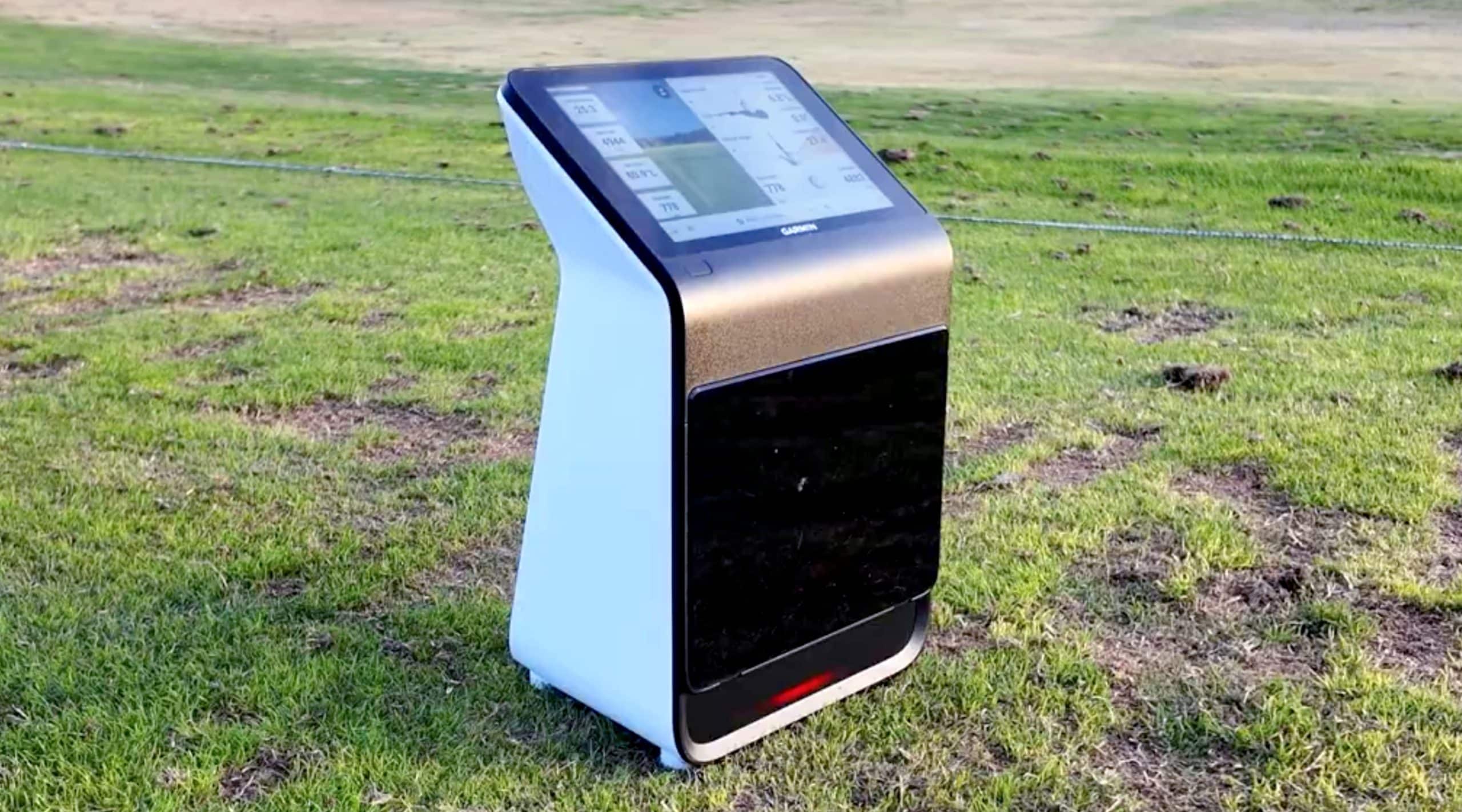 Golf range launch monitor on grass field