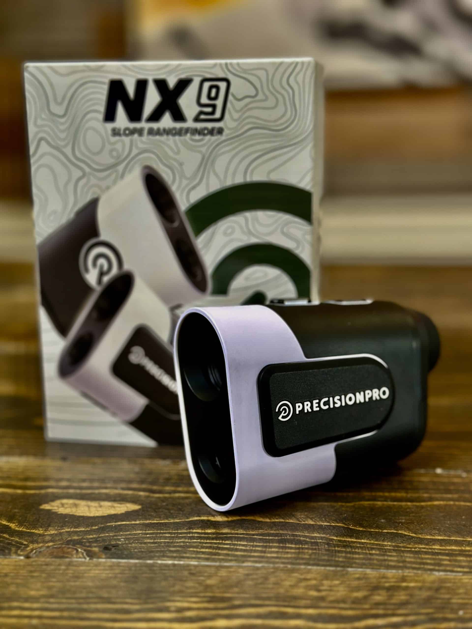 Precision Pro NX9 slope rangefinder on wooden table