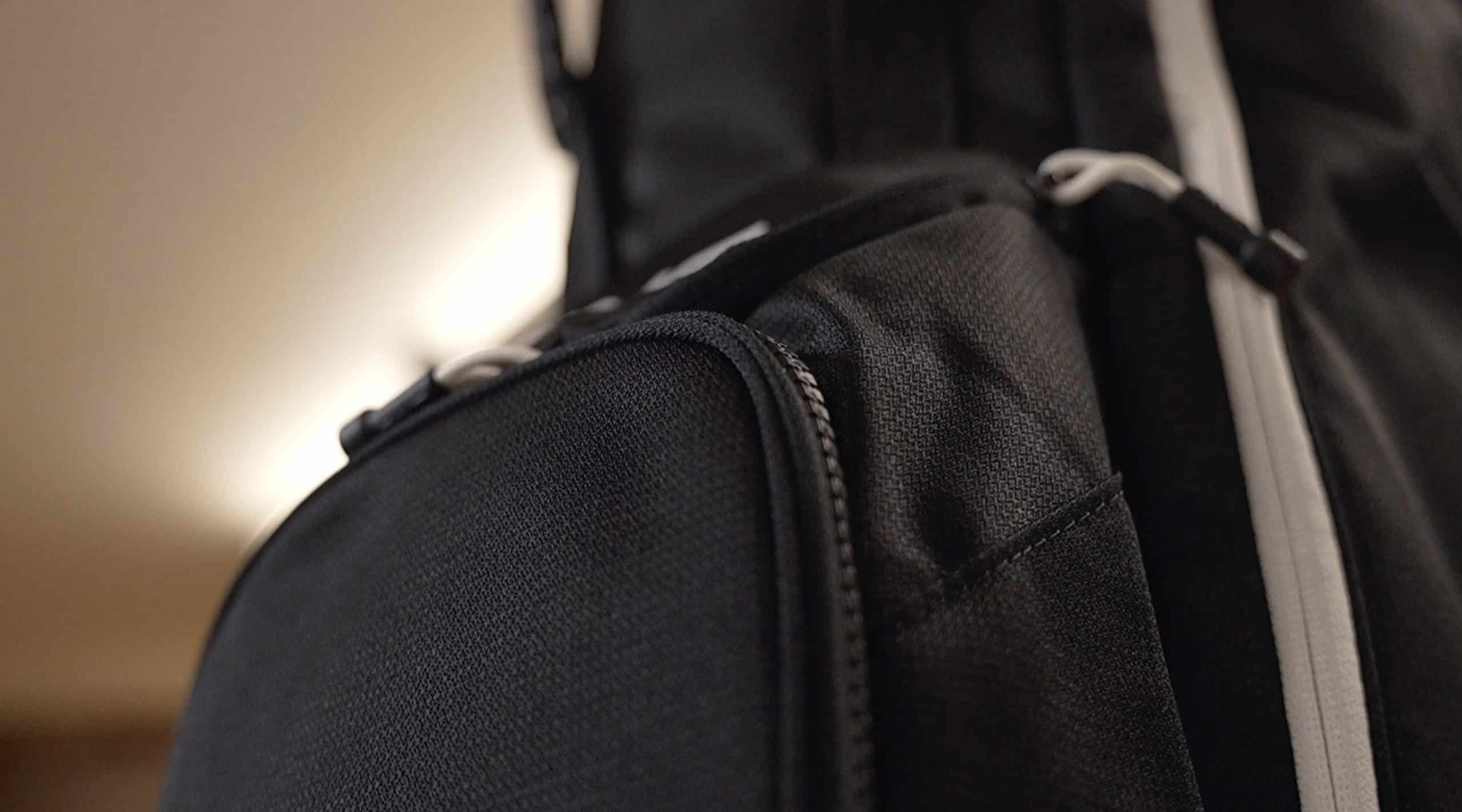 Close-up of black backpack zipper pocket