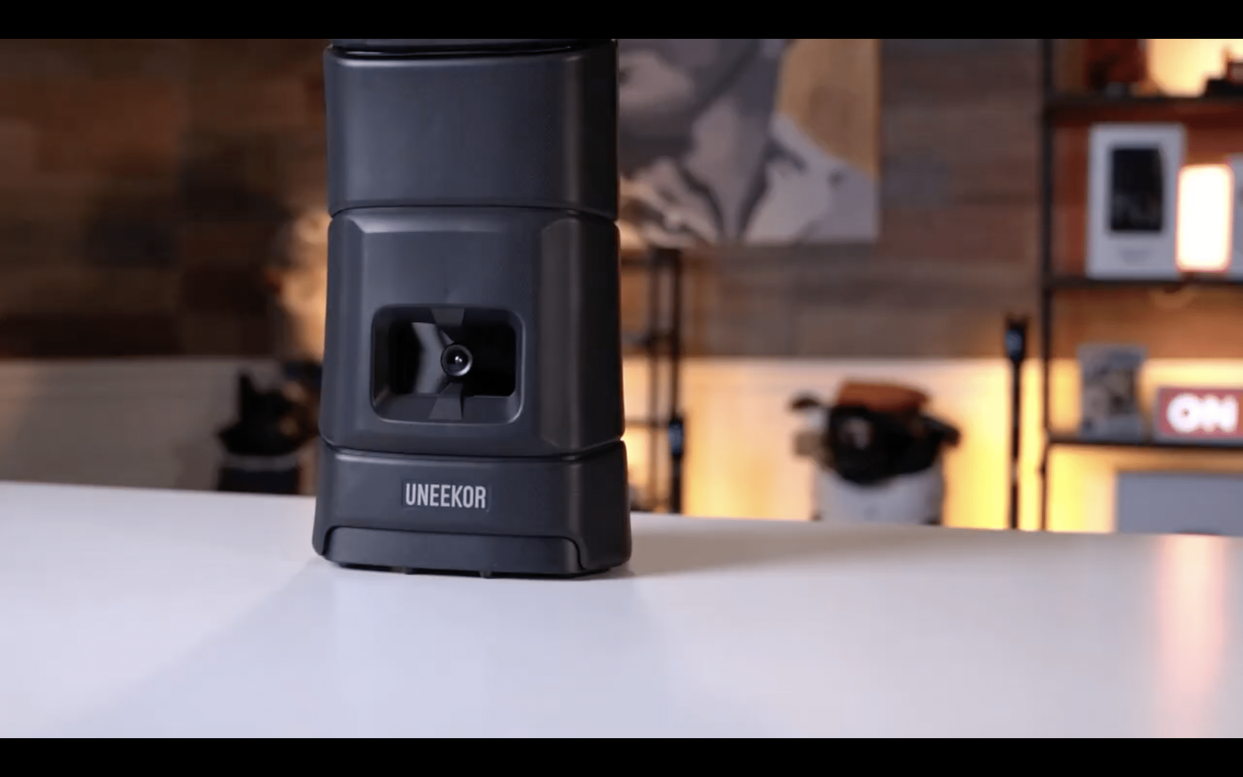 Uneekor golf launch monitor on tabletop