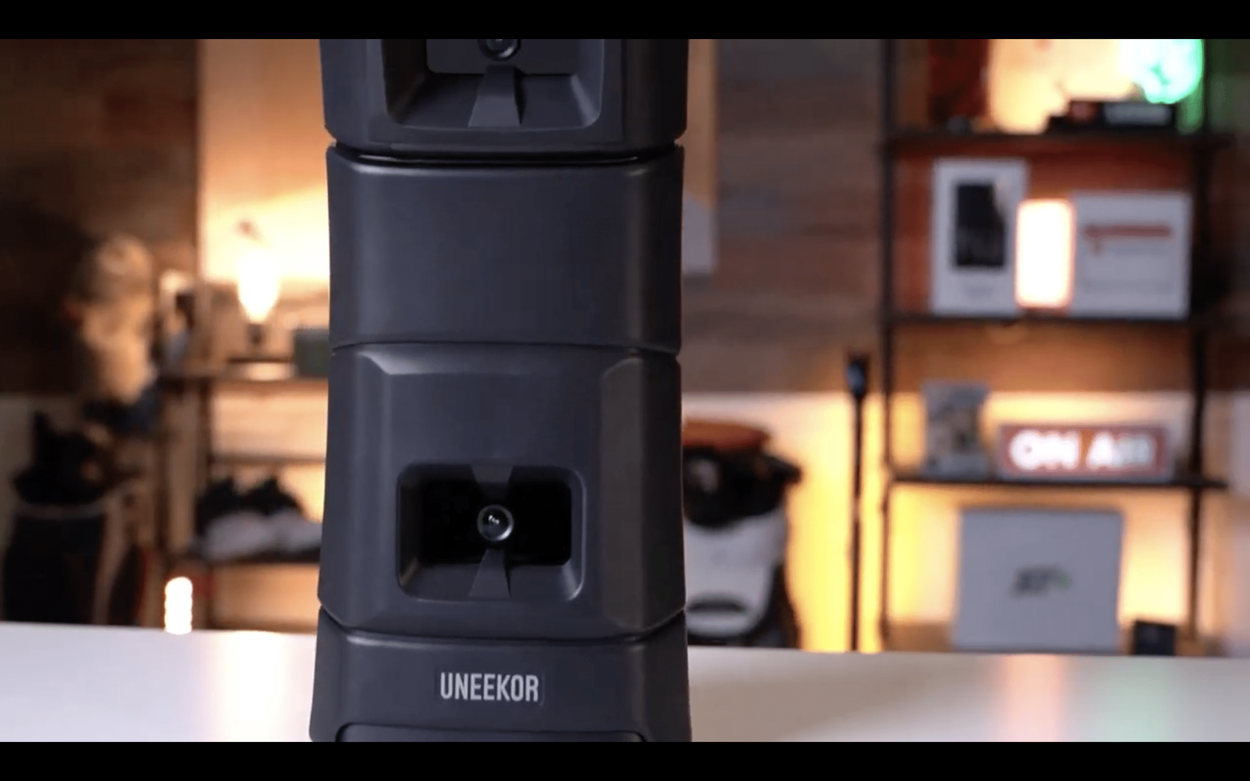 Uneekor golf simulator device on desk