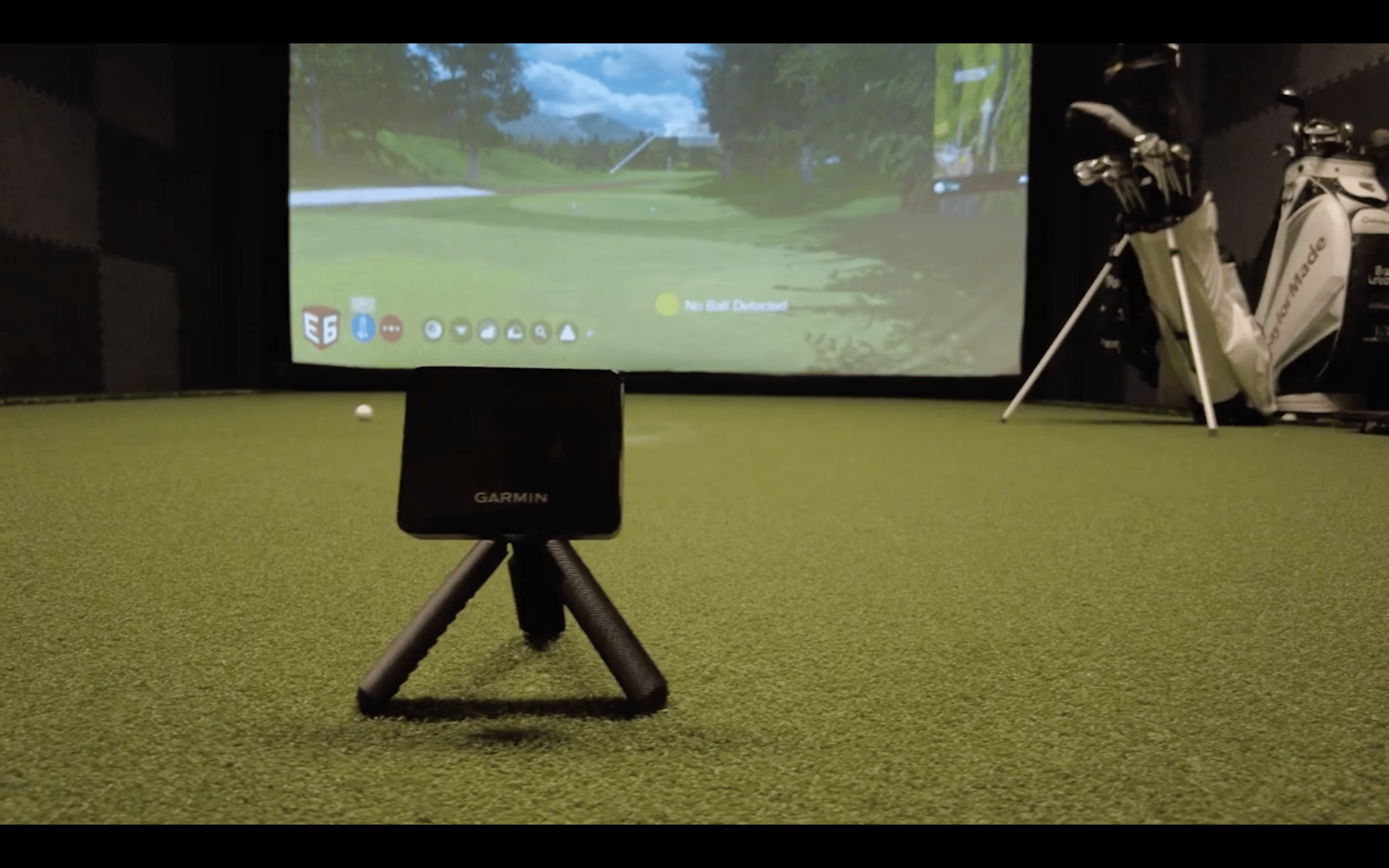 Garmin golf simulator setup on indoor green