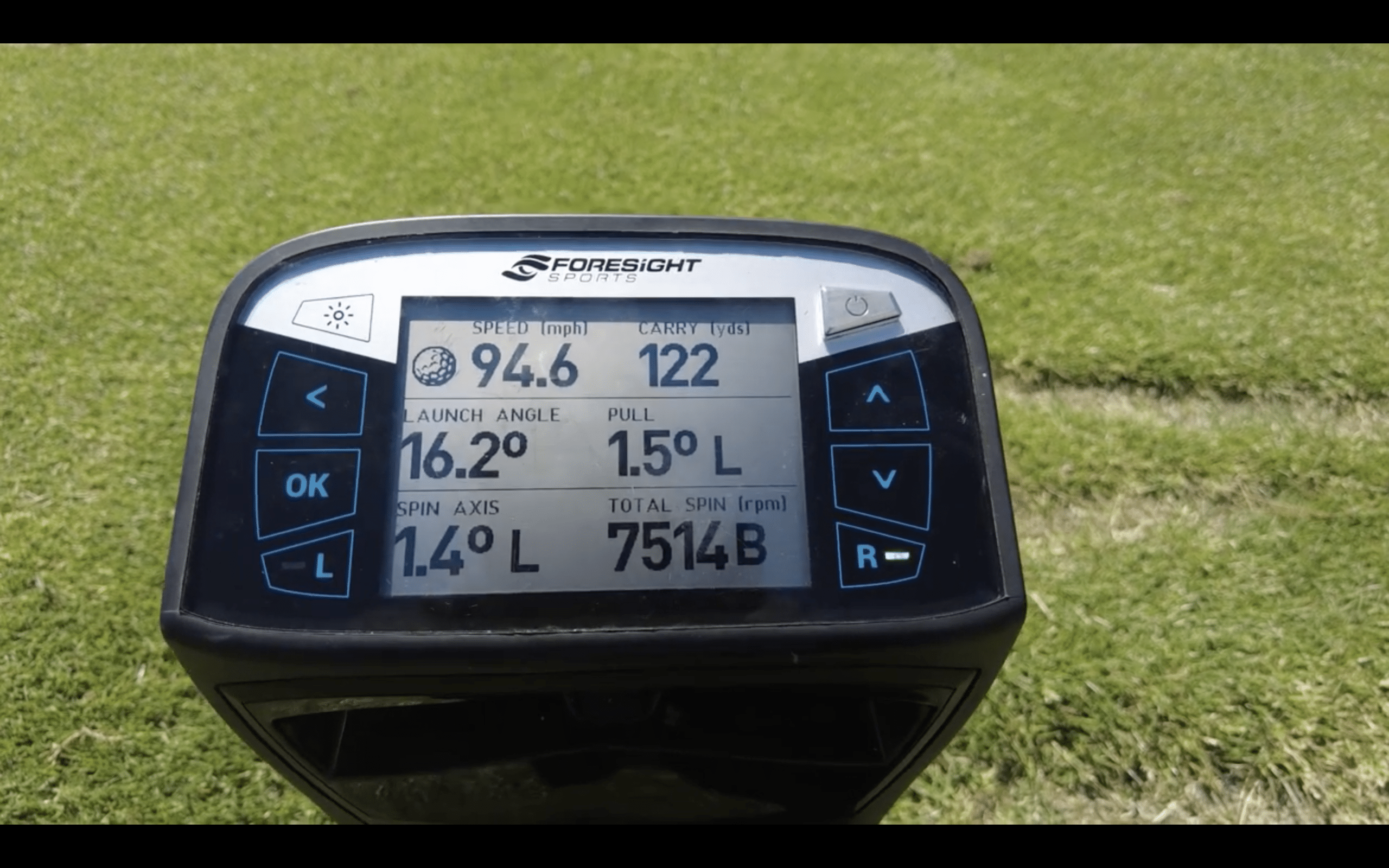Golf launch monitor displaying shot data