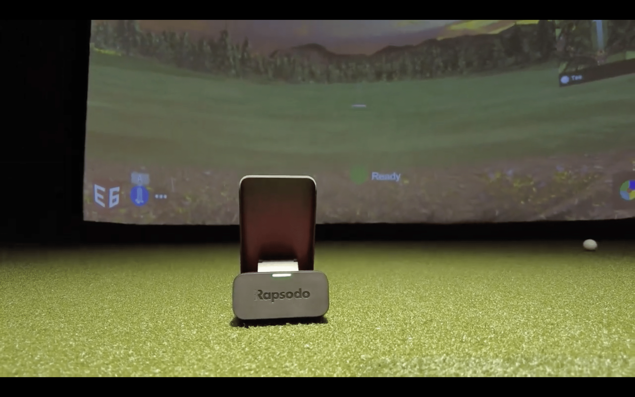 Rapsodo golf launch monitor on indoor simulator setup