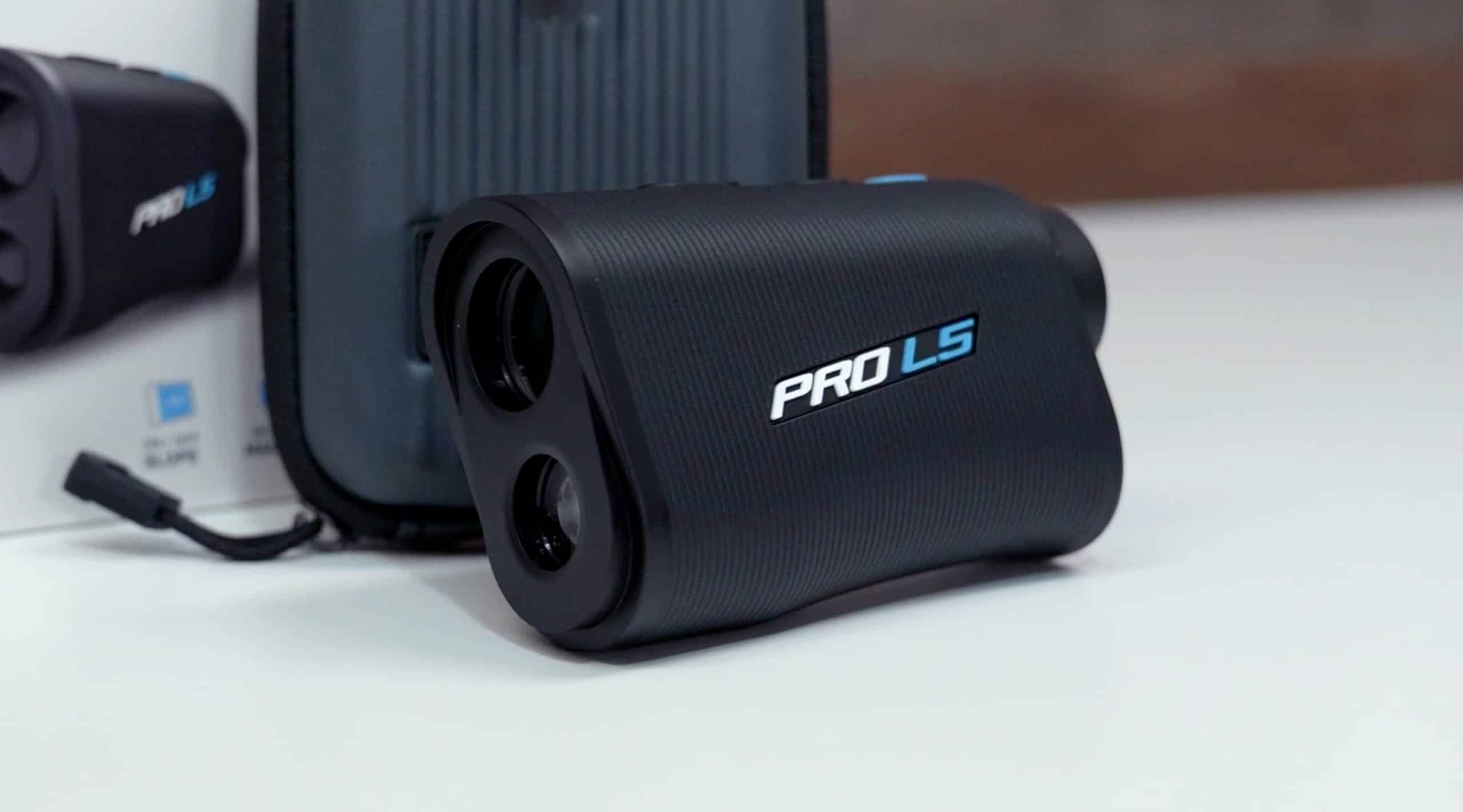 Black PRO L5 golf rangefinder on table