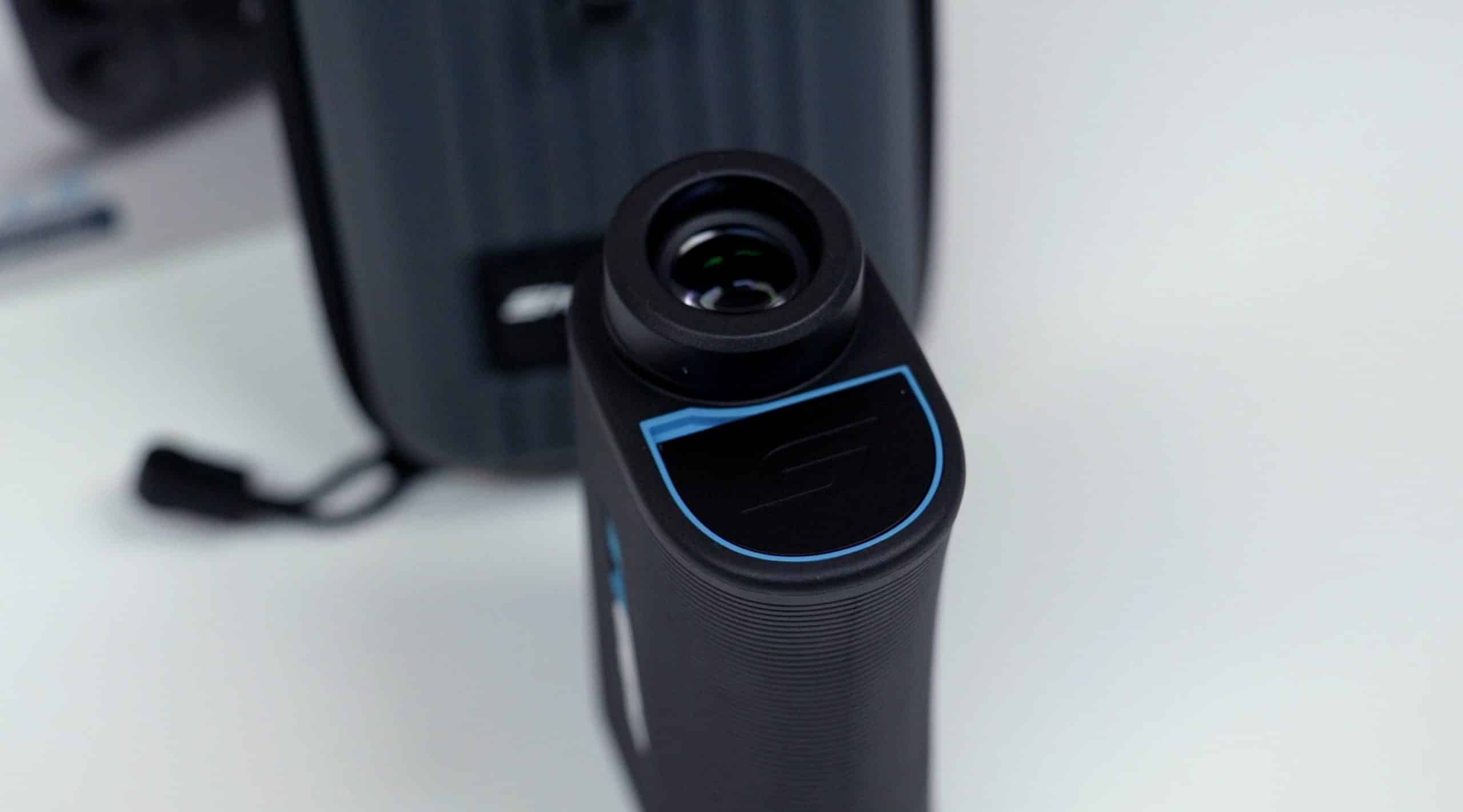 Black digital rangefinder with carrying case