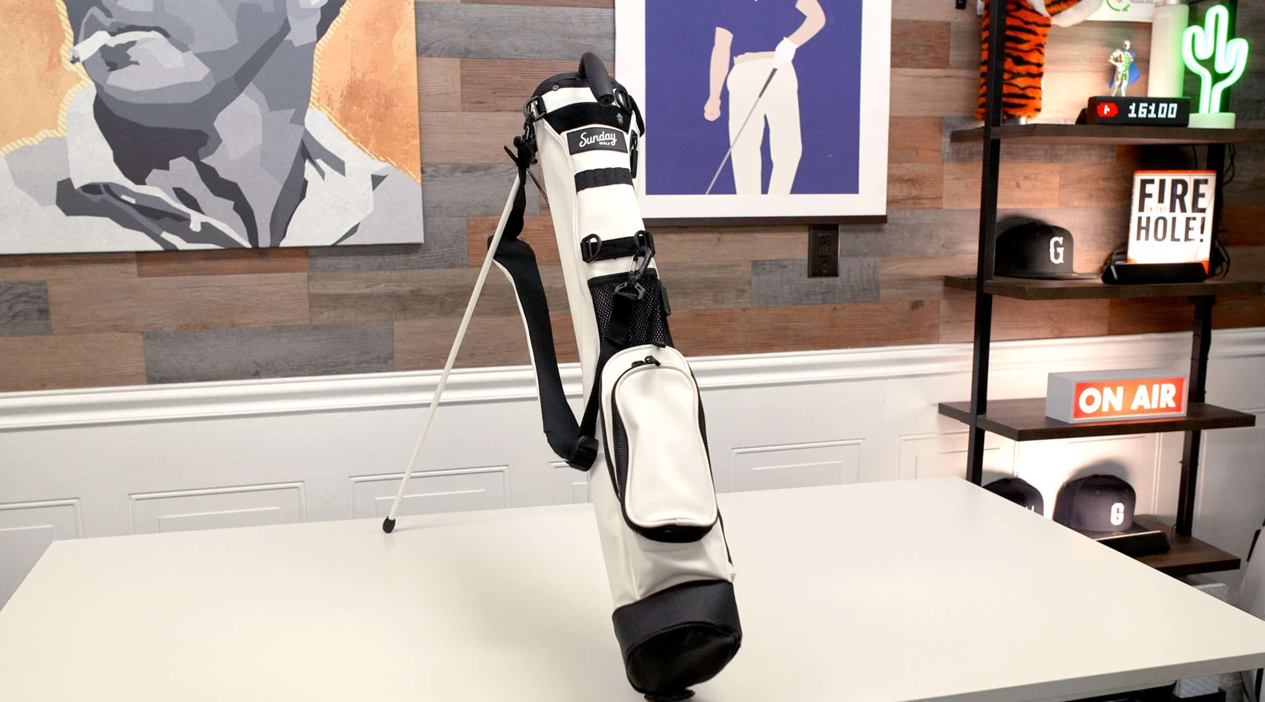 White Sunday golf bag on office table