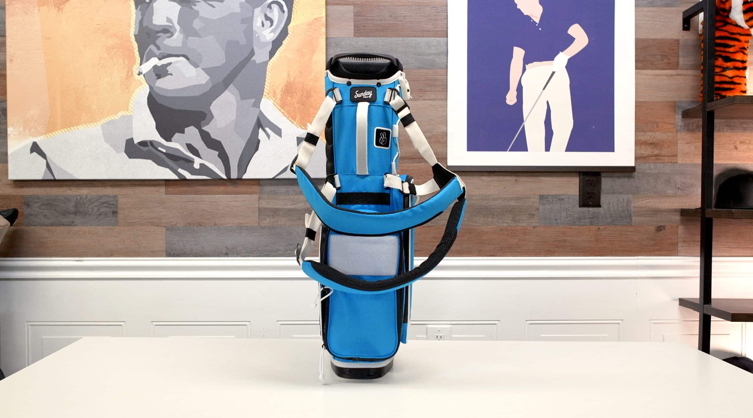 Blue golf bag on table indoors