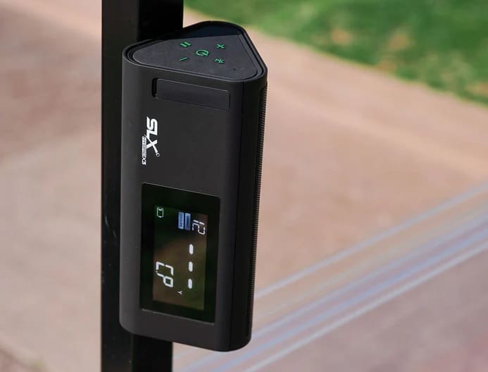 Portable black Bluetooth speaker outdoors