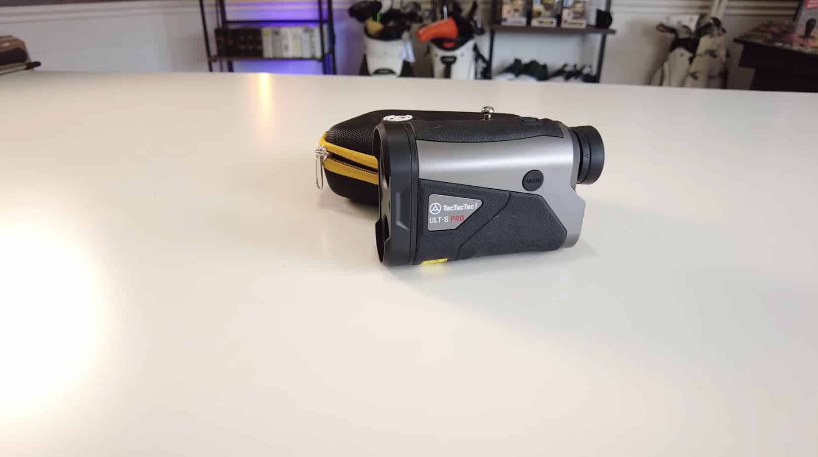 TecTecTec ULT-S Pro golf rangefinder on table