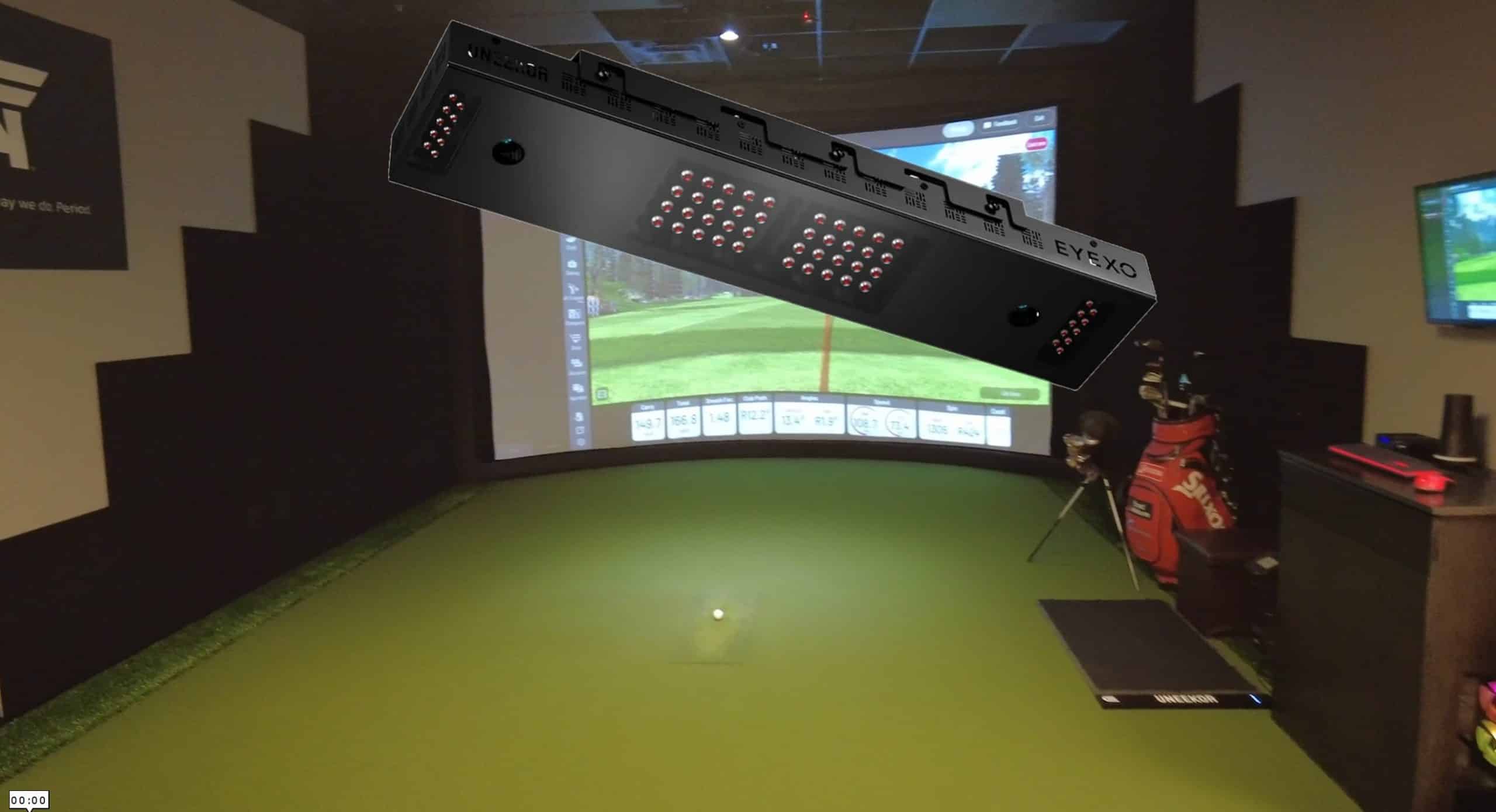 Indoor golf simulator with launch monitor setup