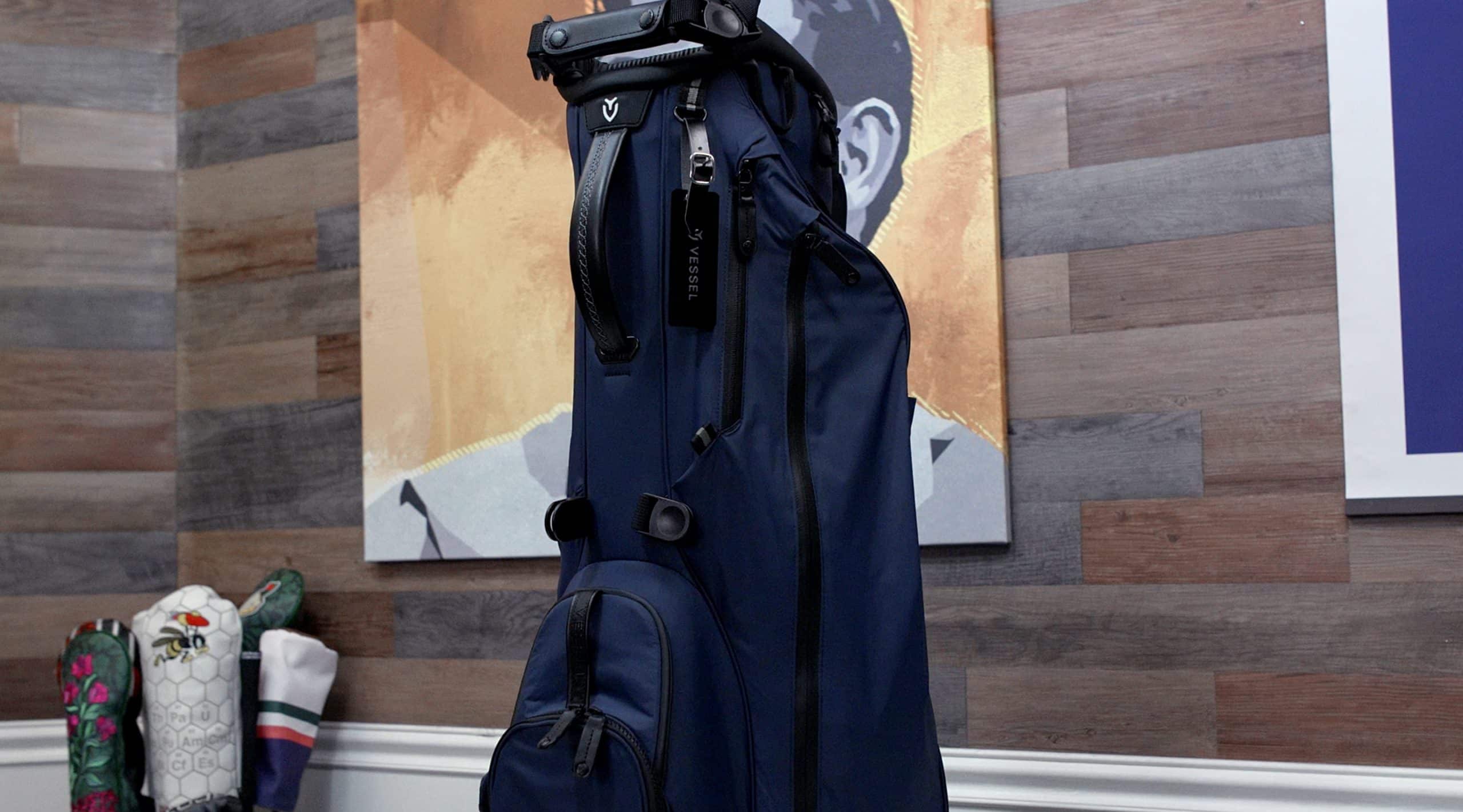 Navy blue Vessel golf travel bag indoors