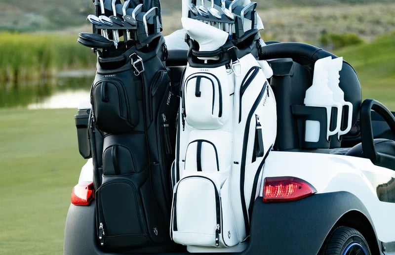 Golf bags on cart at golf course