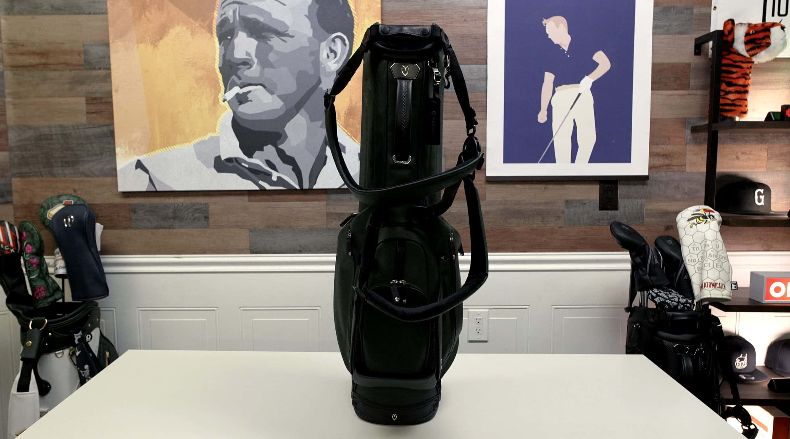 Black golf bag on display table