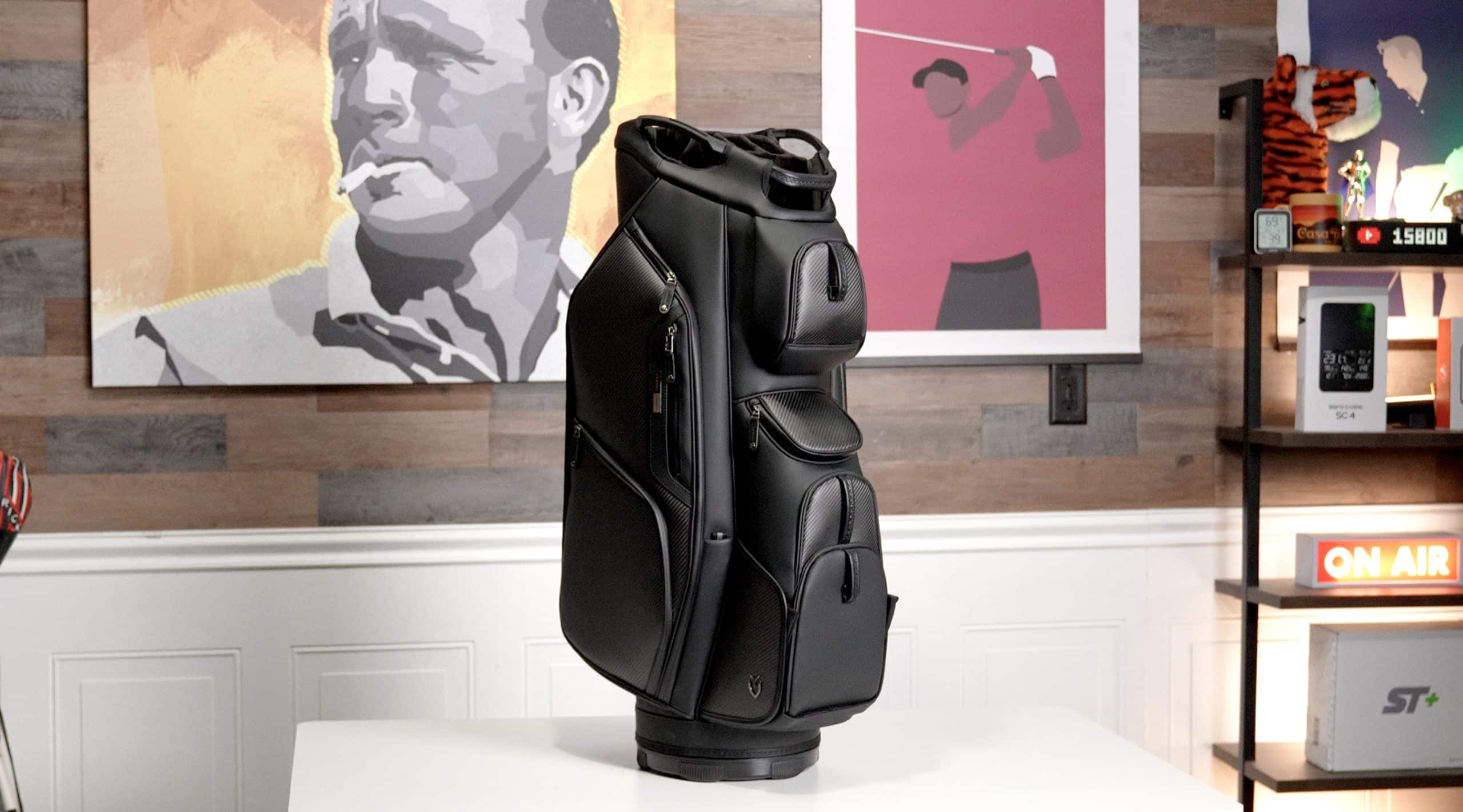 Black golf bag on table in modern room