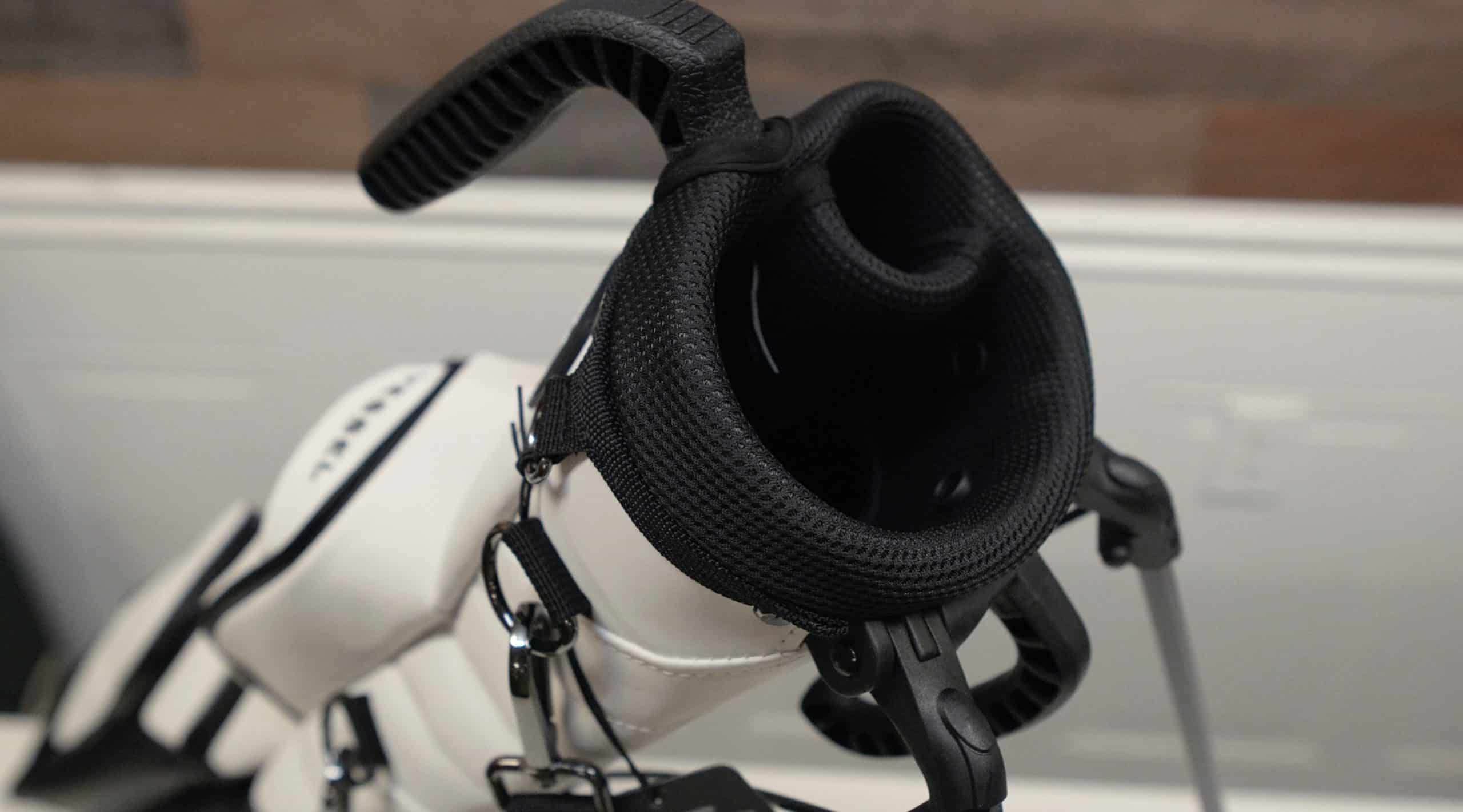 White golf bag with black top dividers