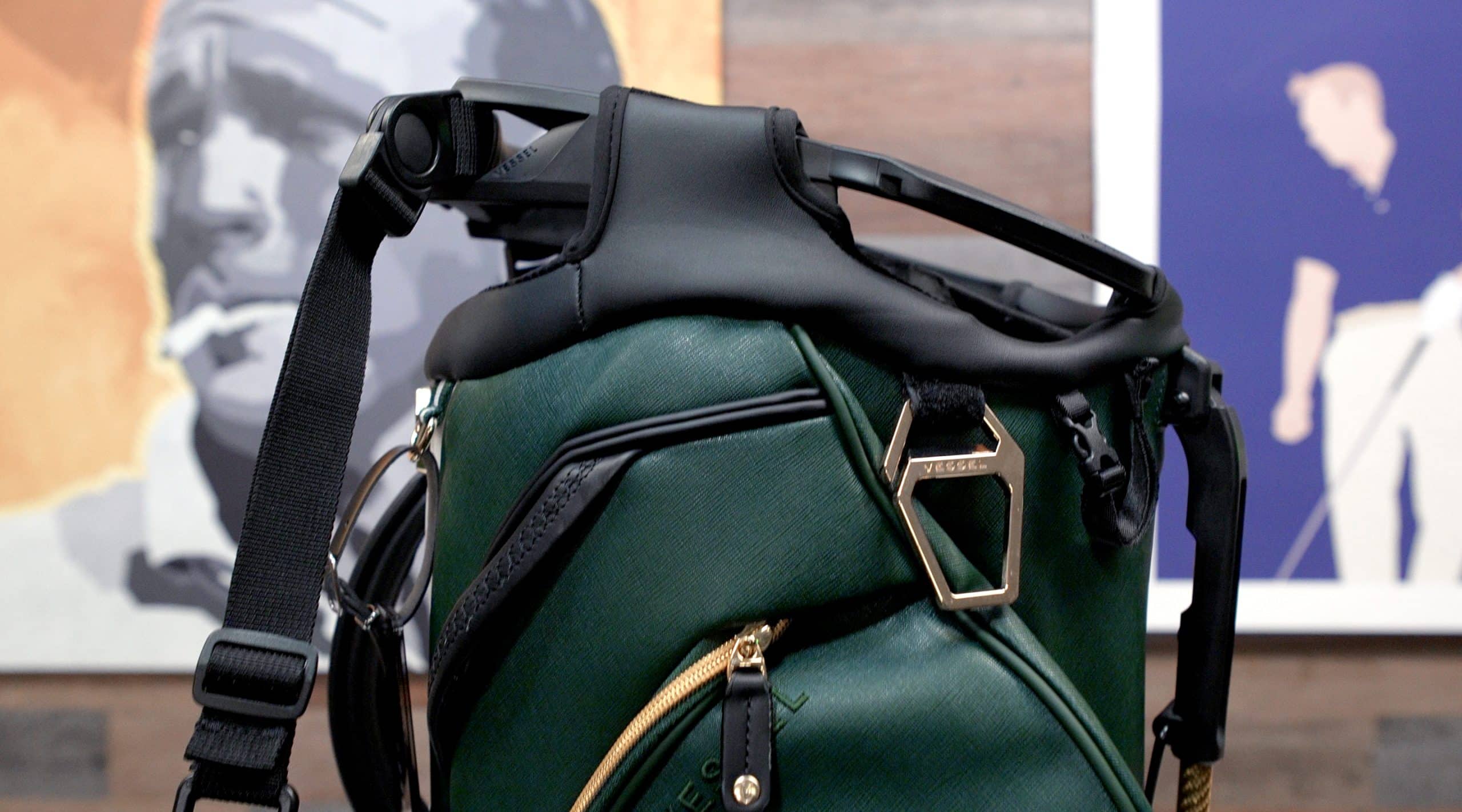 Green leather golf bag with gold zipper