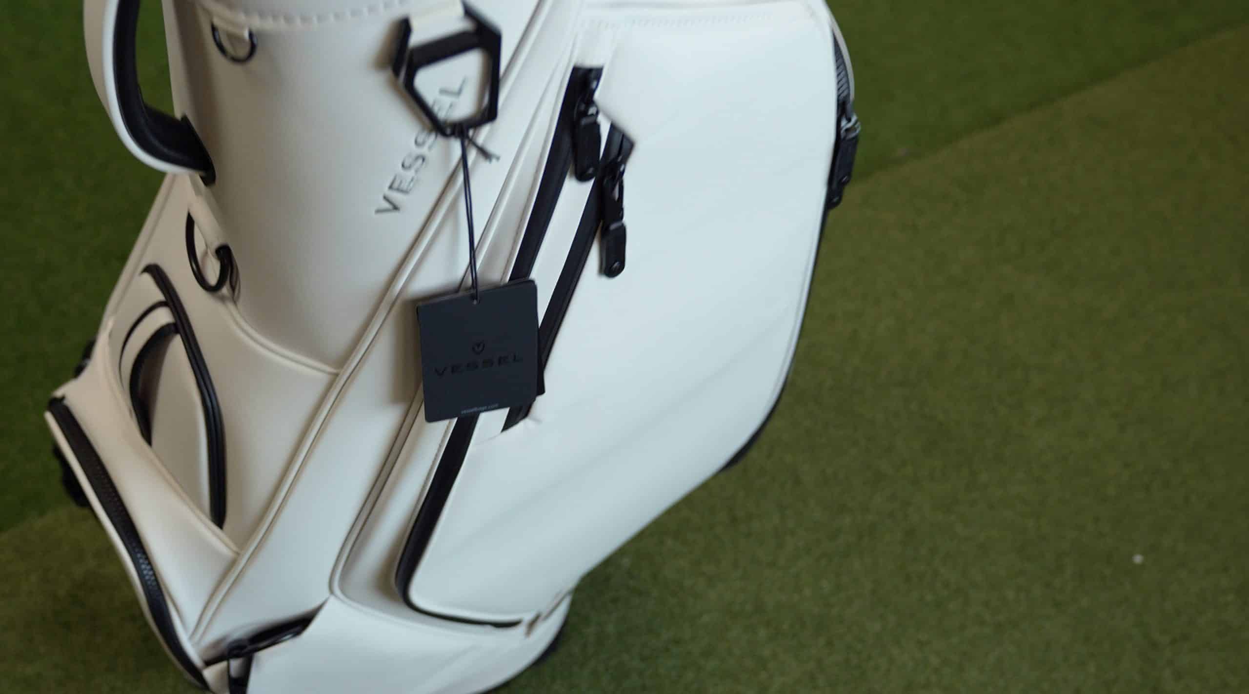 White Vessel golf bag on green turf