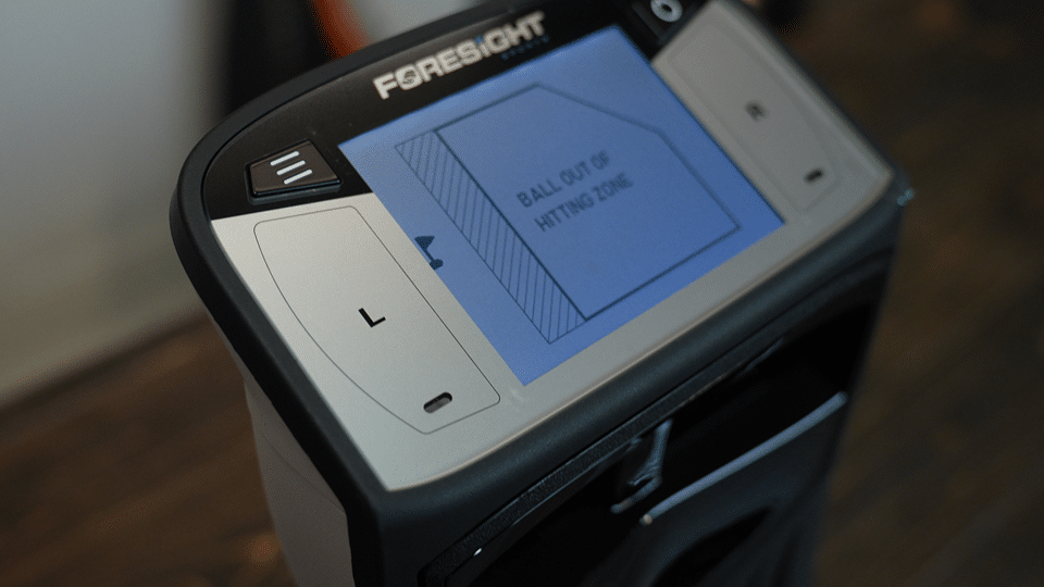 Golf launch monitor screen showing hitting zone warning