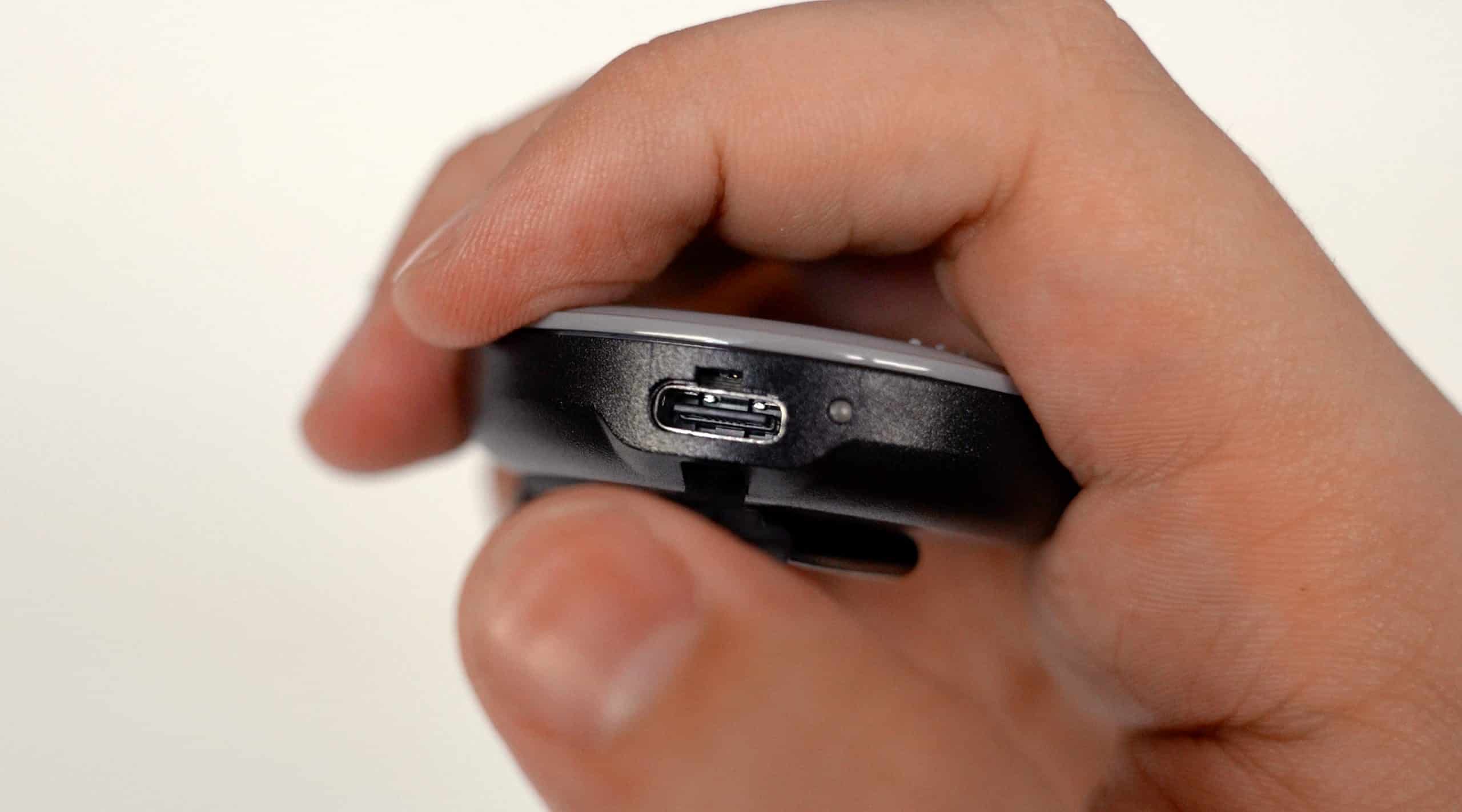 Hand holding device with USB-C port